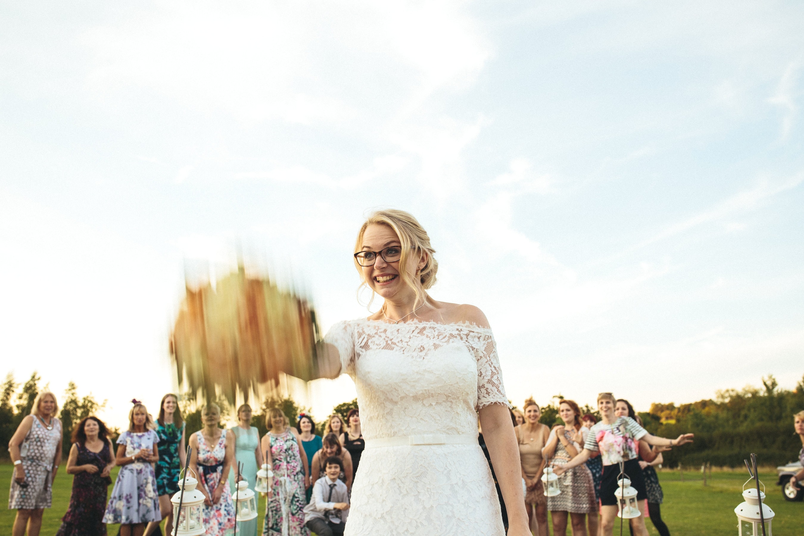 bouquet toss wedding photo