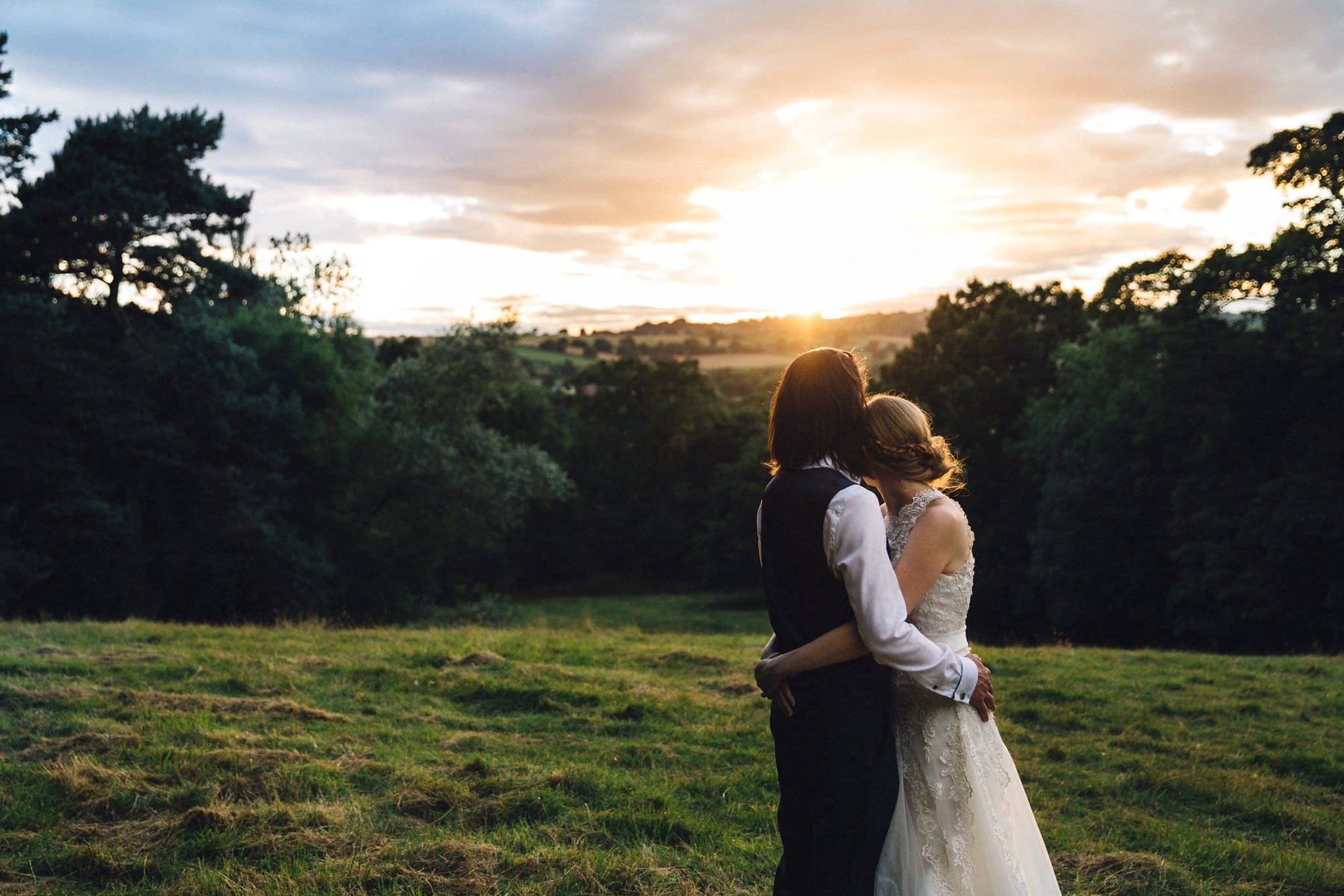 bride and groom sunset