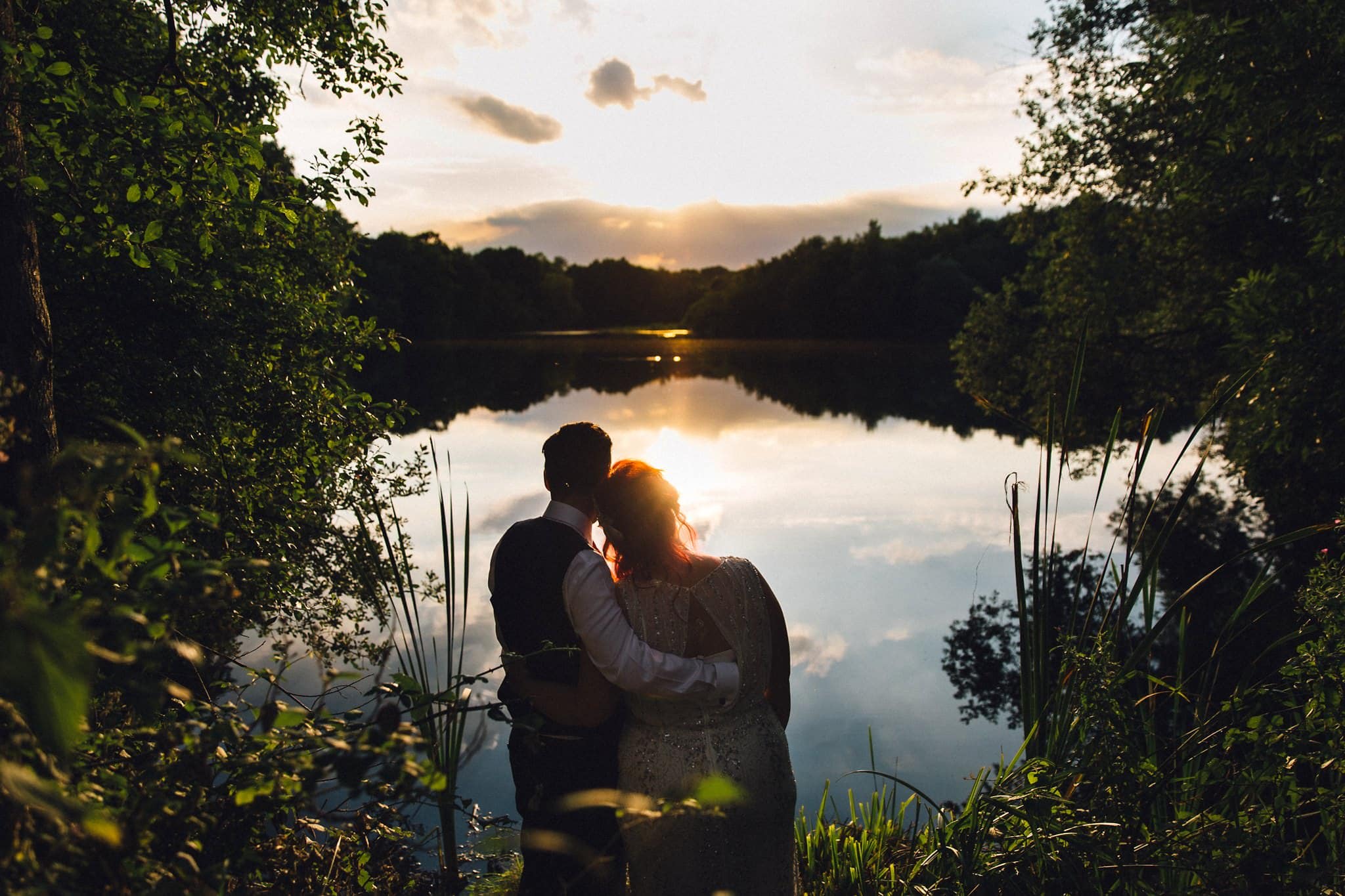 watching sunset bride and groom