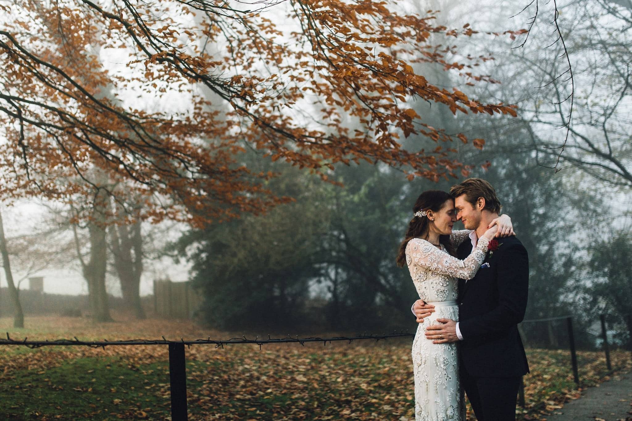 wintry mist bride groom wedding portrait in peak district