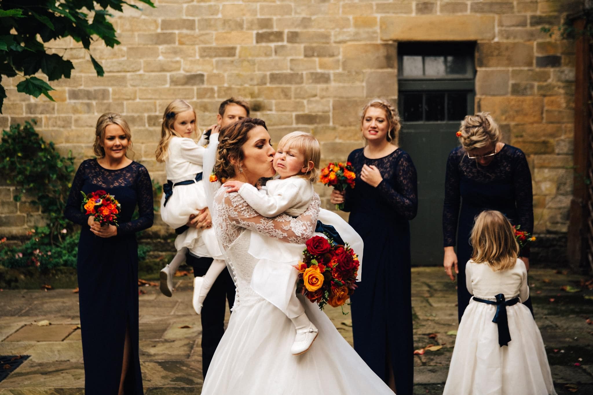 imperfect wedding photo flower girl crying