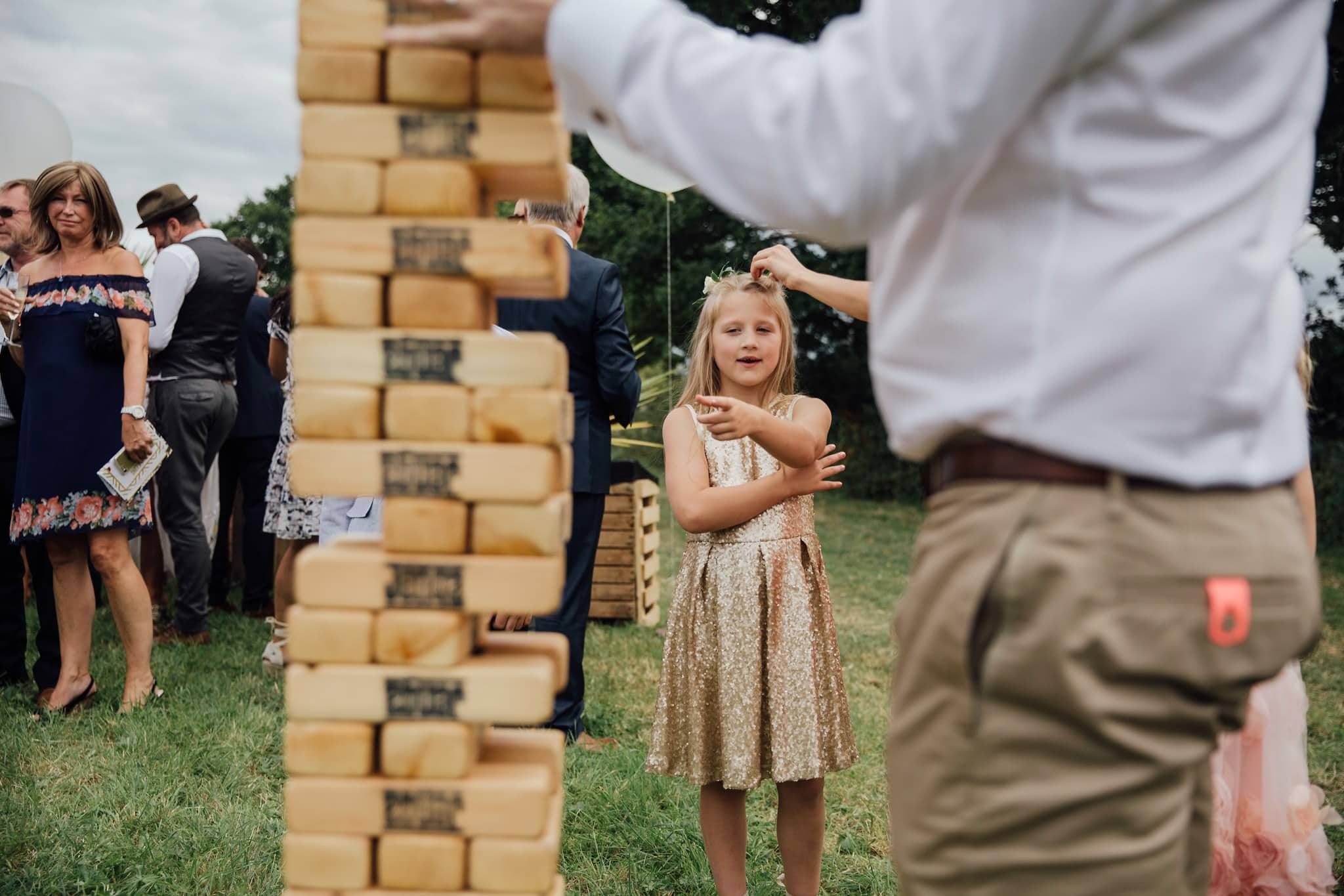 flower girl playing jenga