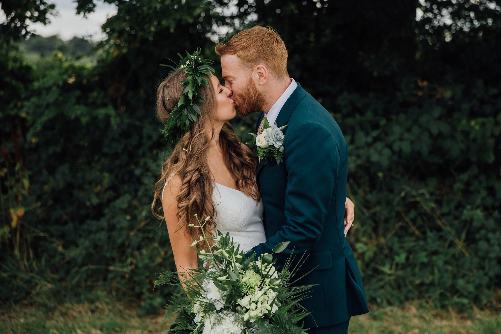 love authentic bride and groom kissing