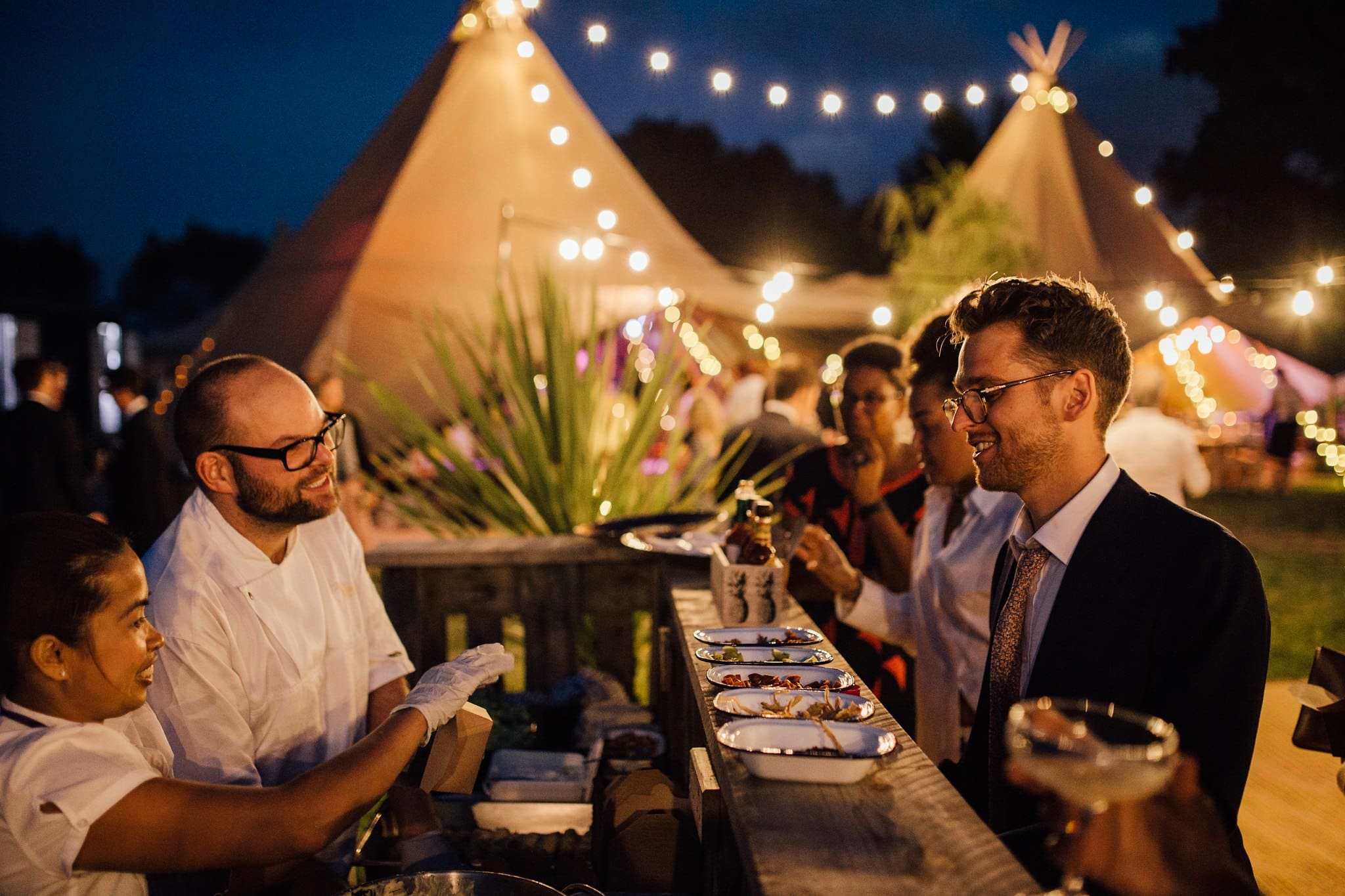 wedding caterers serving fish tacos