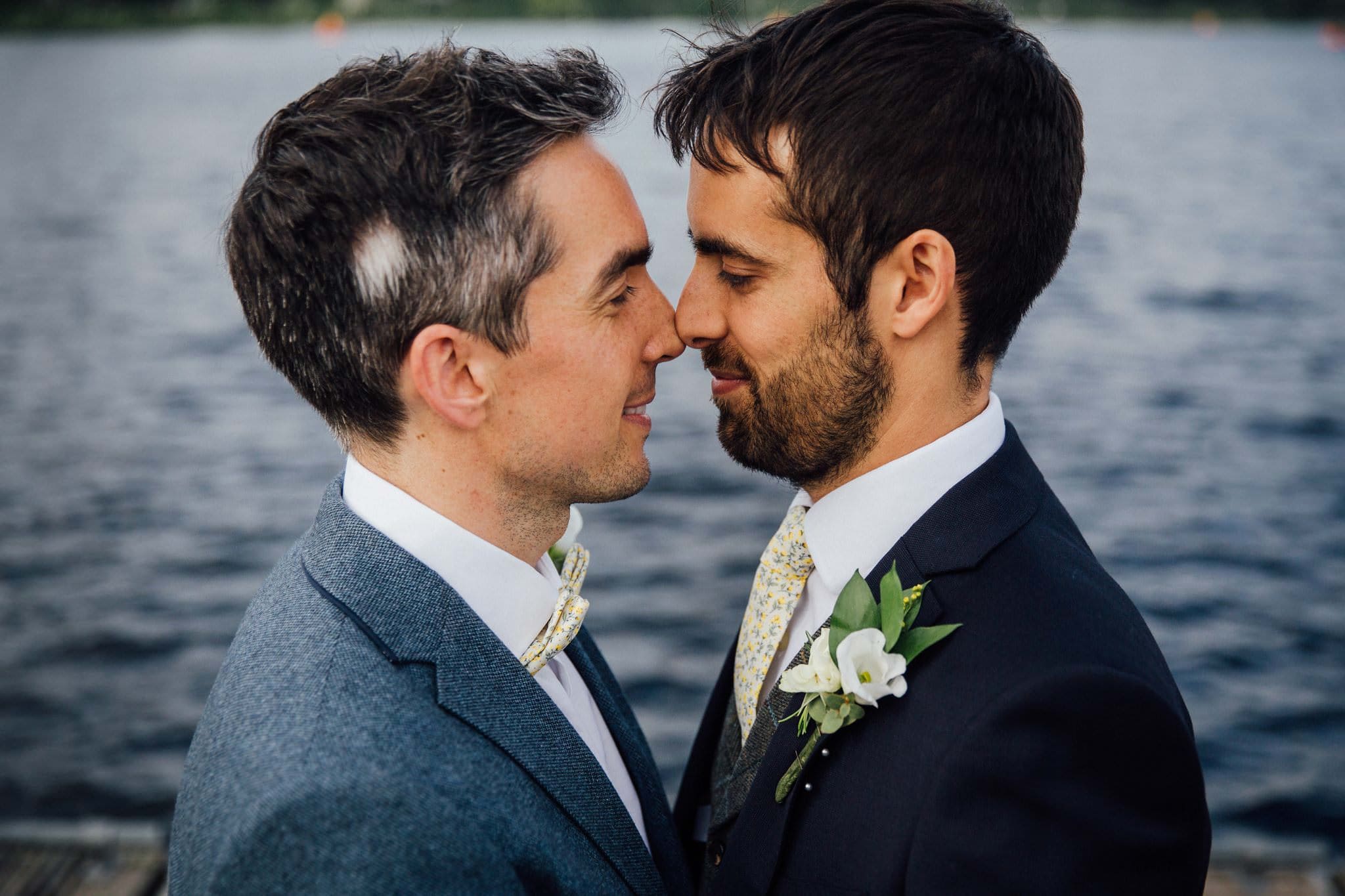 close up portrait of two grooms