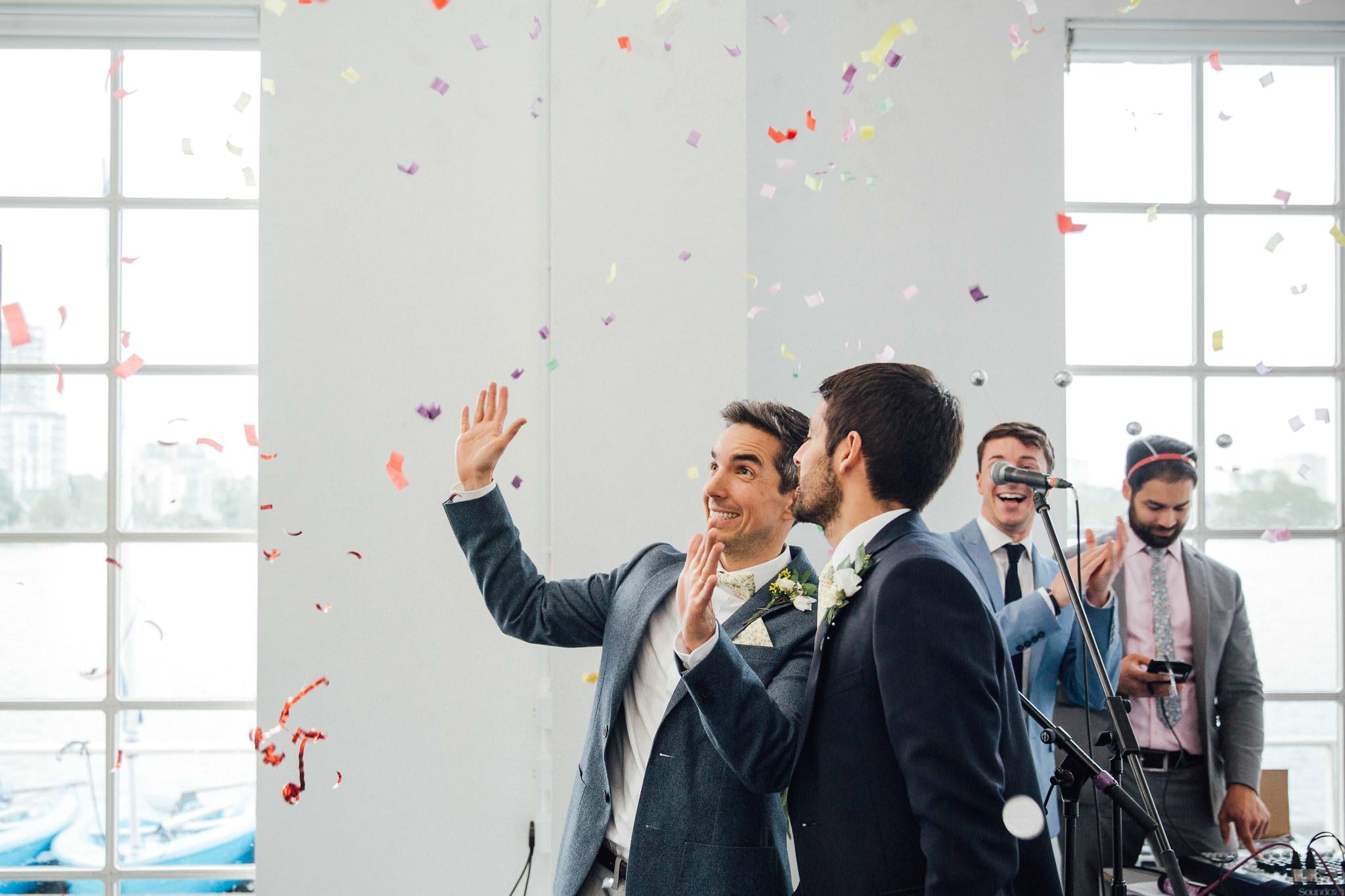 grooms showered in confetti