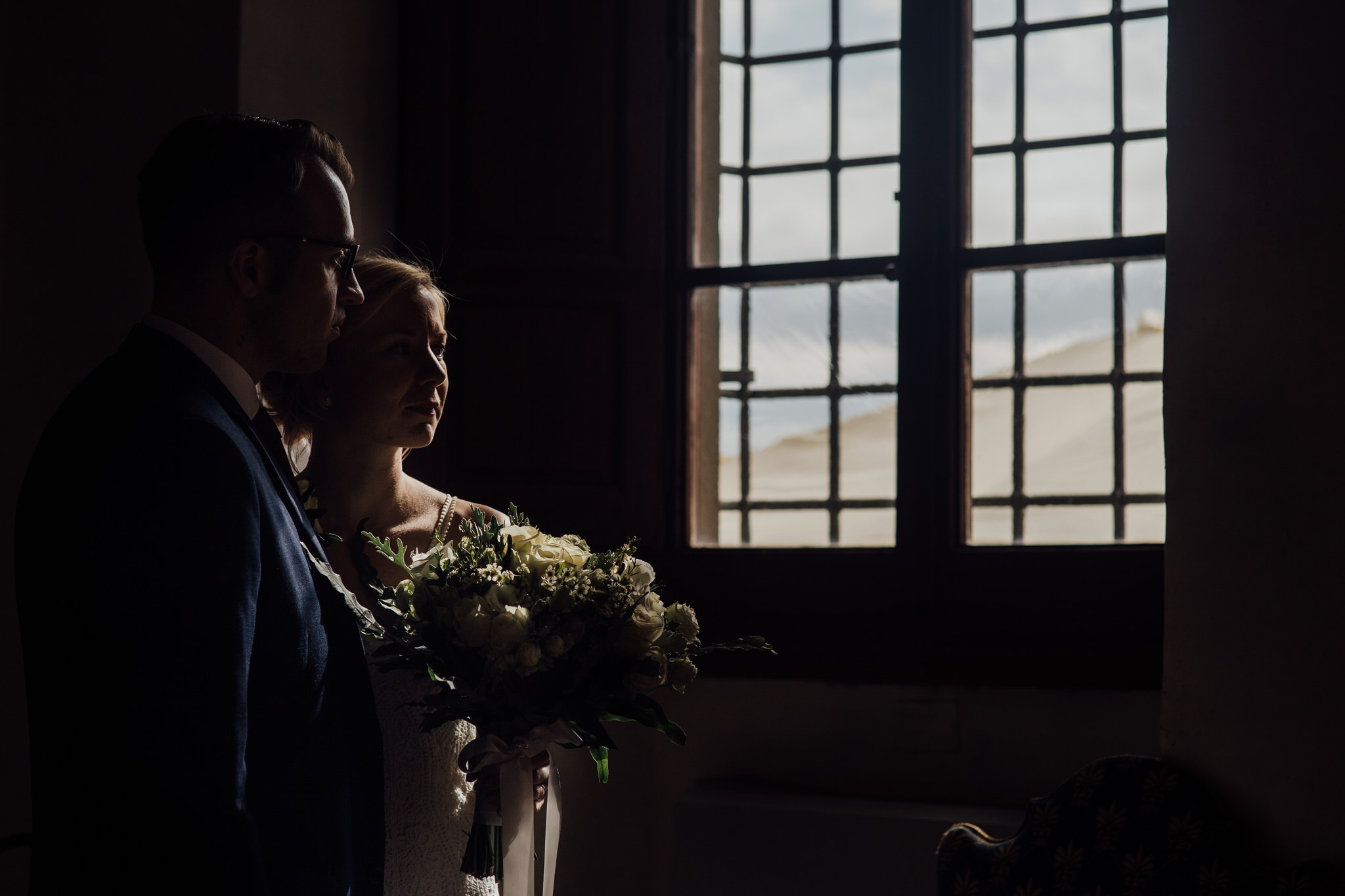 chiaroscuro bride and groom portrait