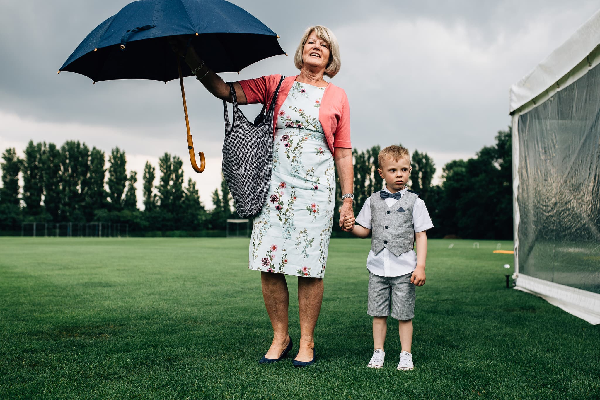 rain and child at wedding