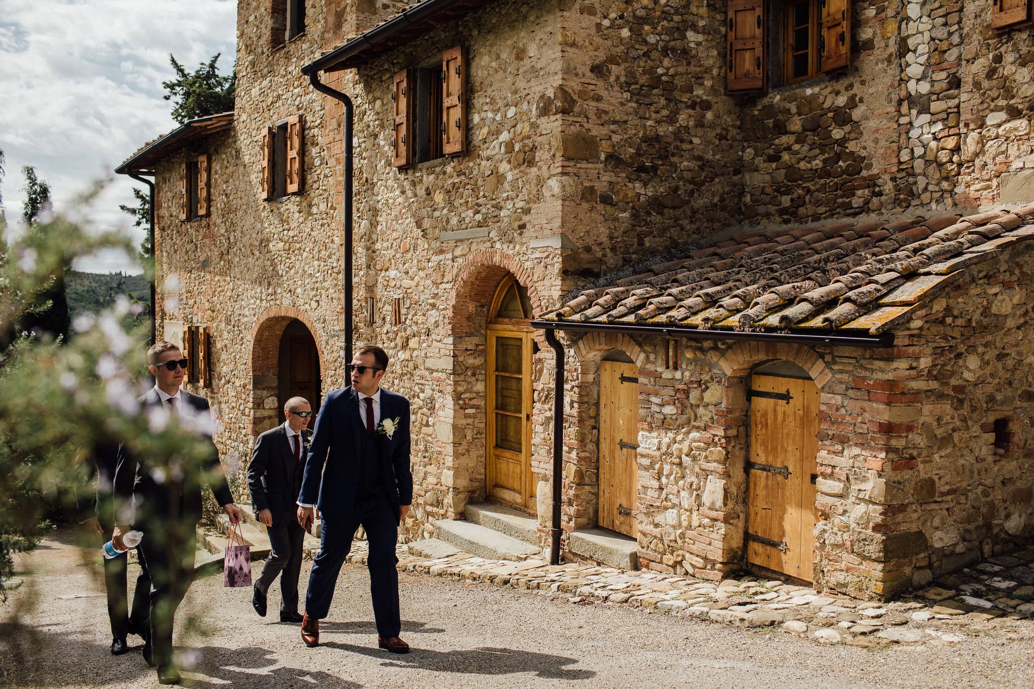 Tuscany Castello Wedding Groom walking to Ceremony