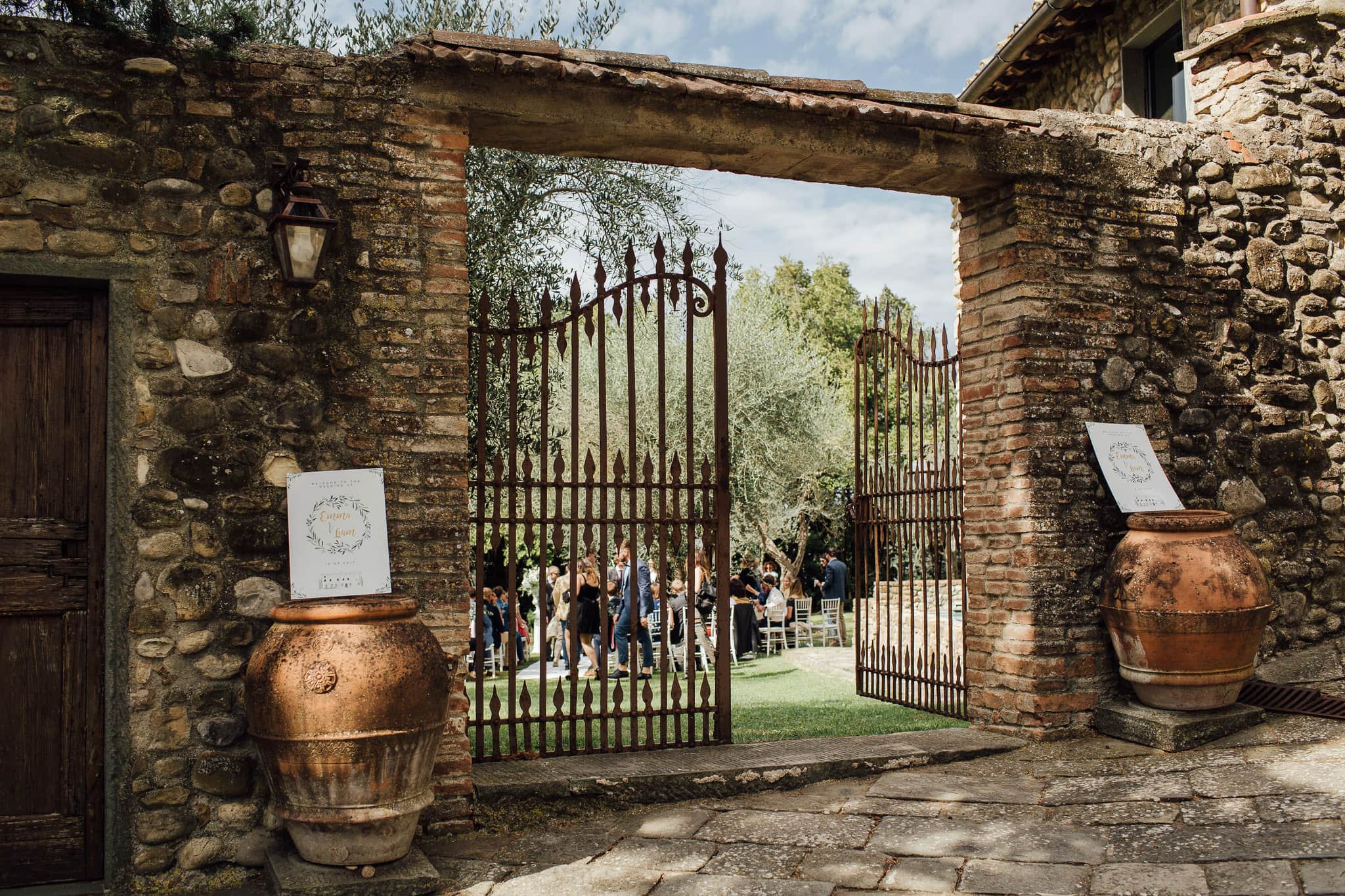 Gates to olive grove ceremony