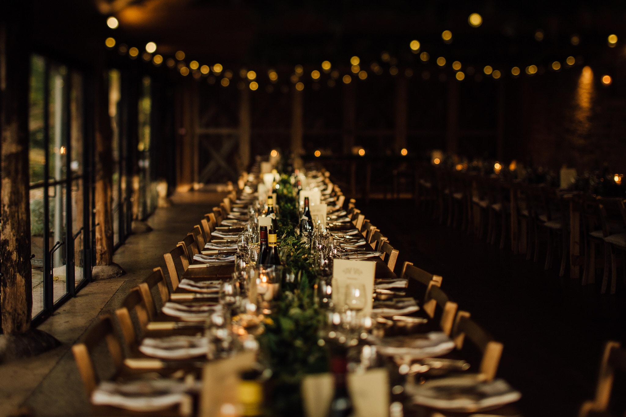 long tables in barn at Dewsall Court