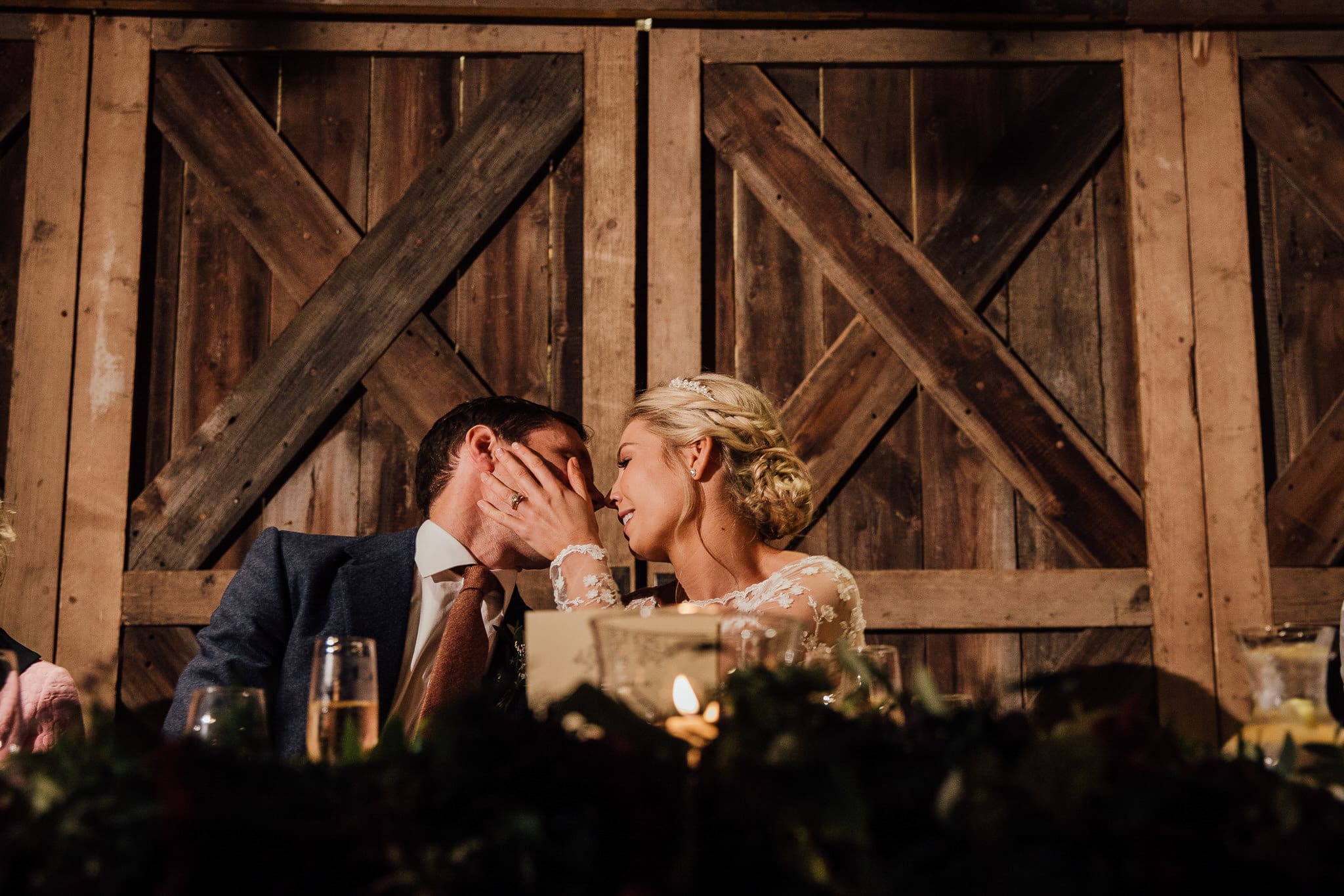 tender moment caught between bride and groom