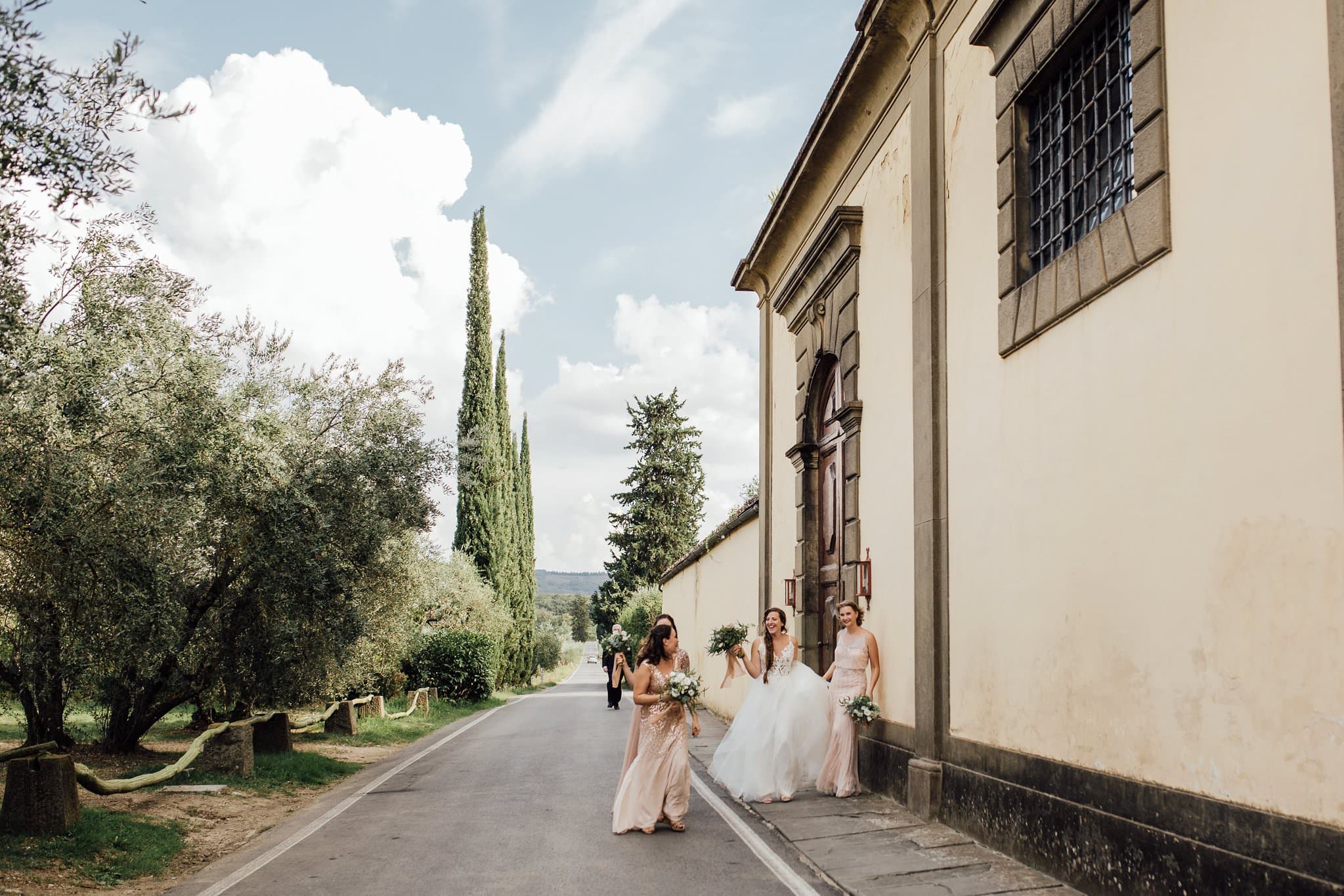 bride and bridesmaids walking to Italian wedding ceremony