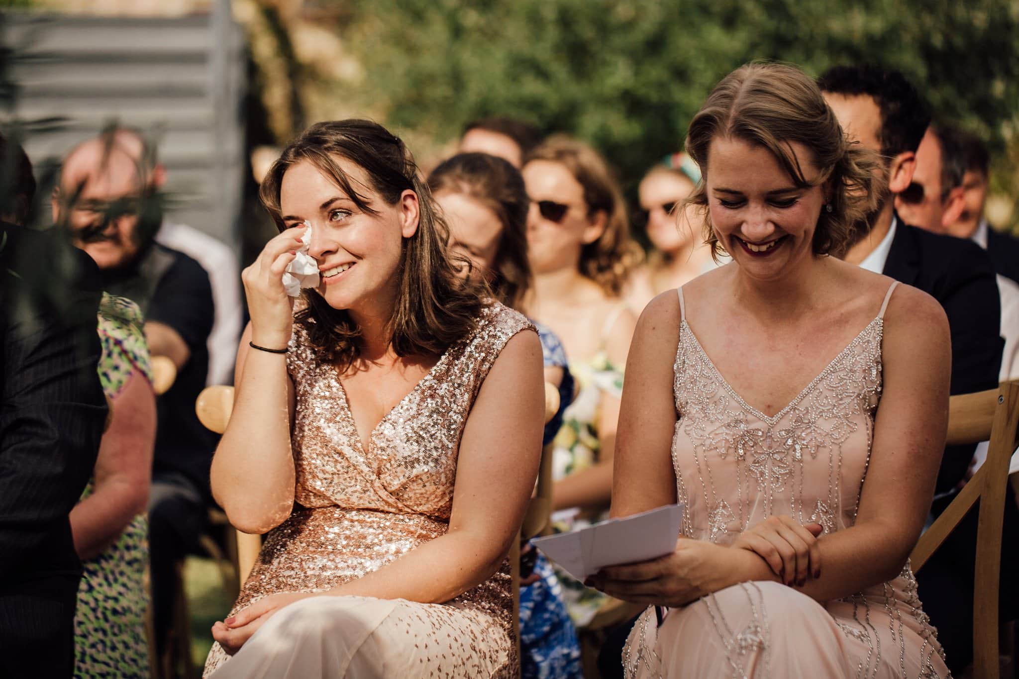 bridesmaid getting emotional during wedding ceremony