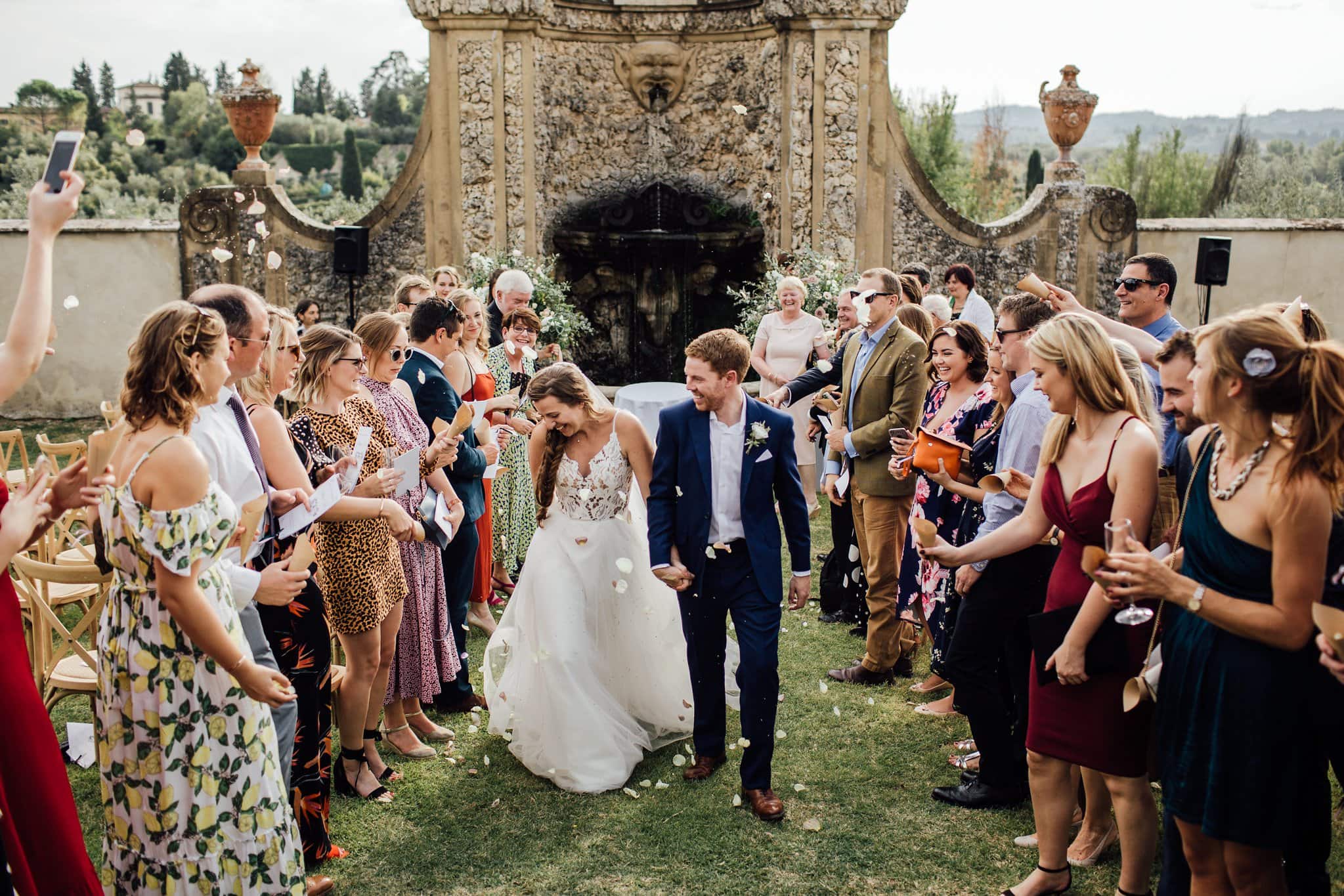 confetti shot as bride and groom exit ceremony