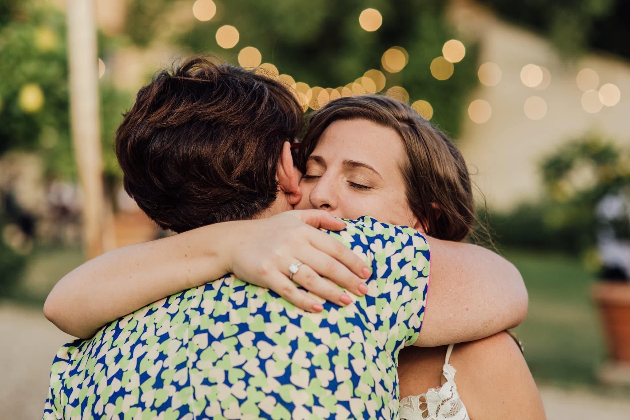 big hug for bride and her mum