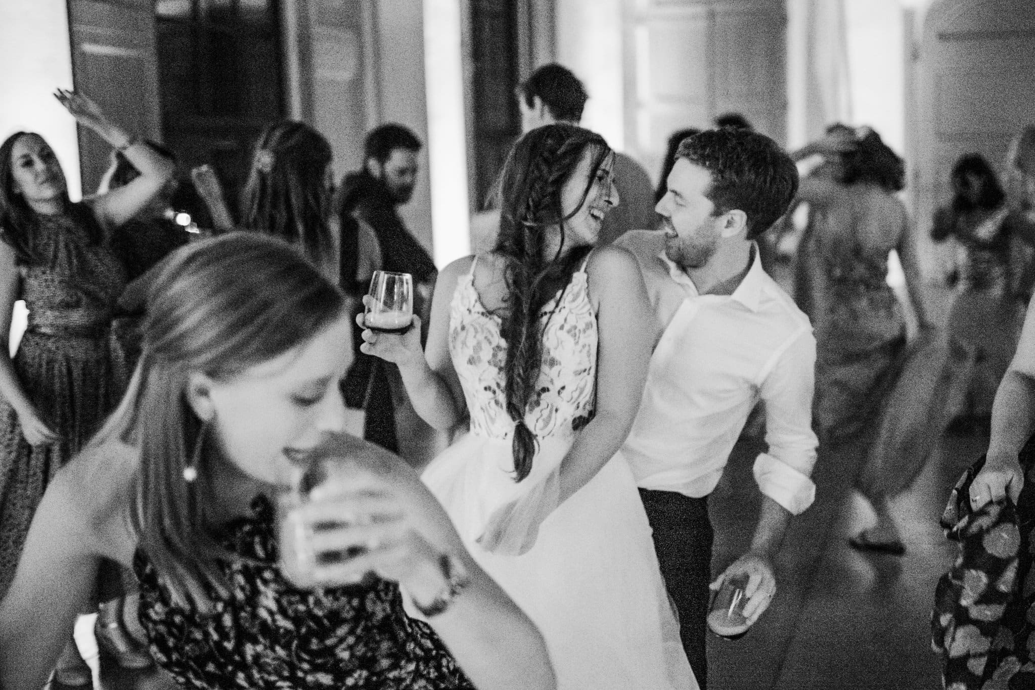 black and white photograph of bride and groom dancing at Italian wedding