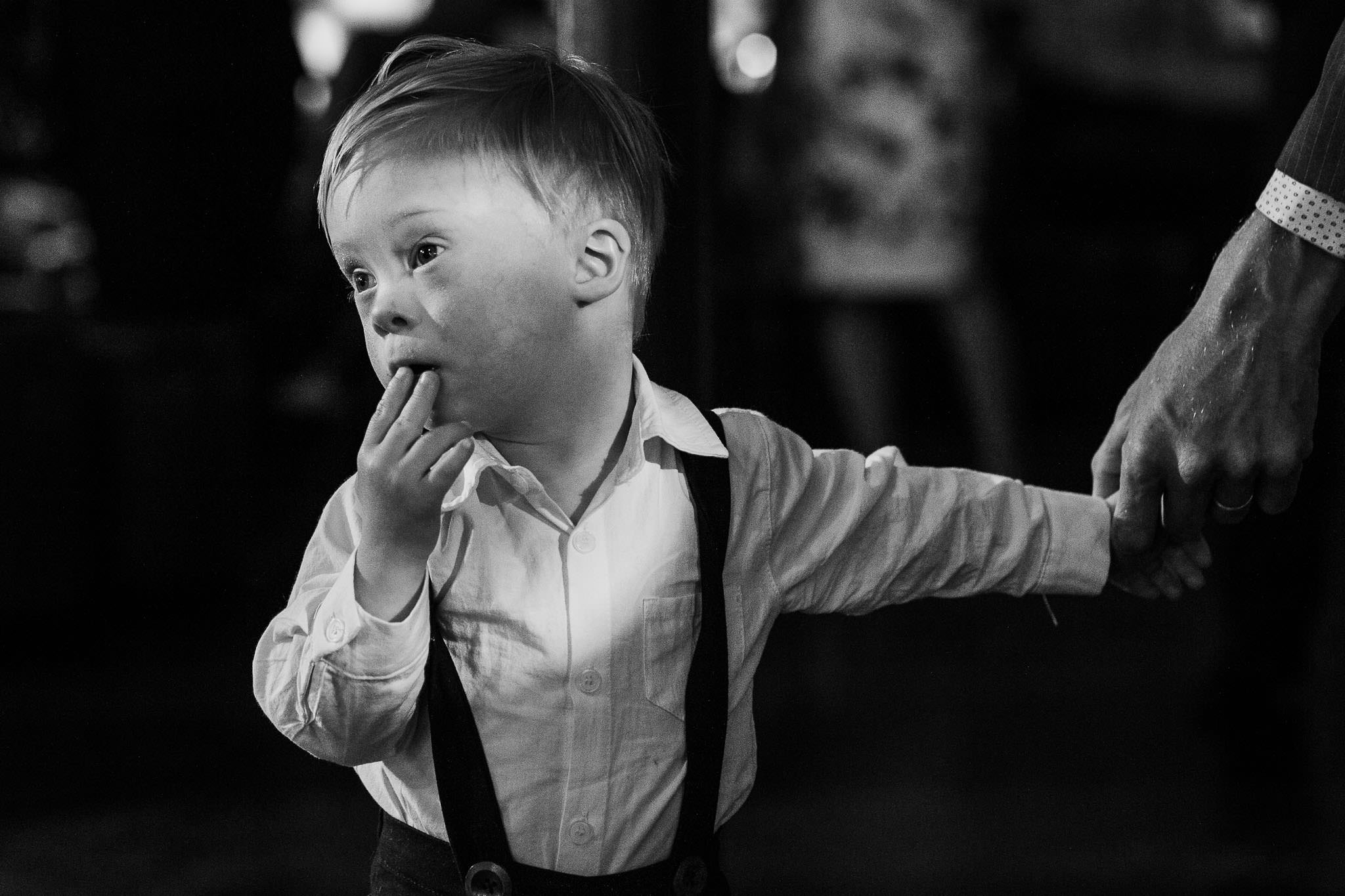 wedding photojournalism candid capture of little page boy