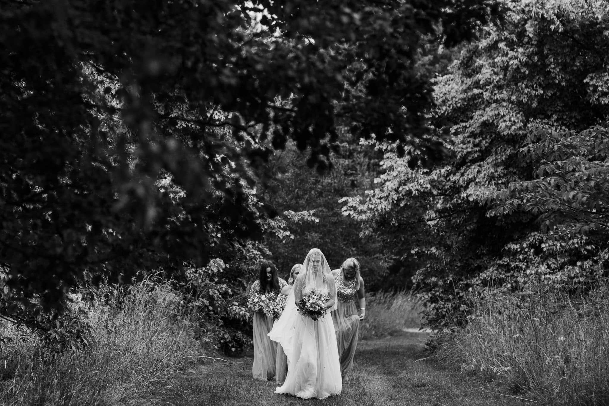 yorkshire arboretum wedding bride arriving at outdoor ceremony