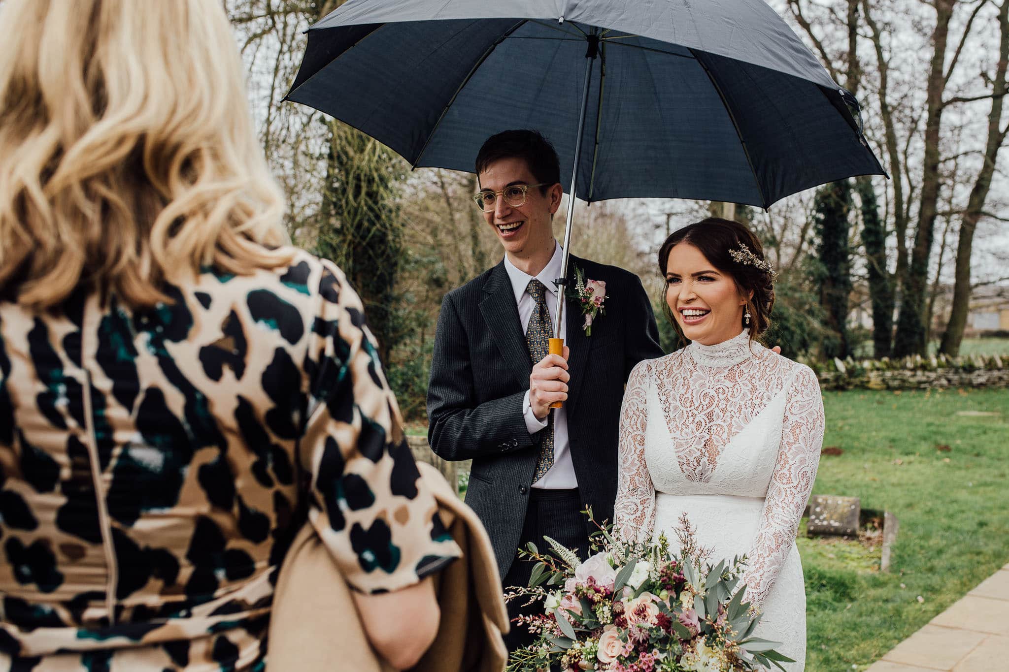 bride in lace high neck gown by karen willis holmes