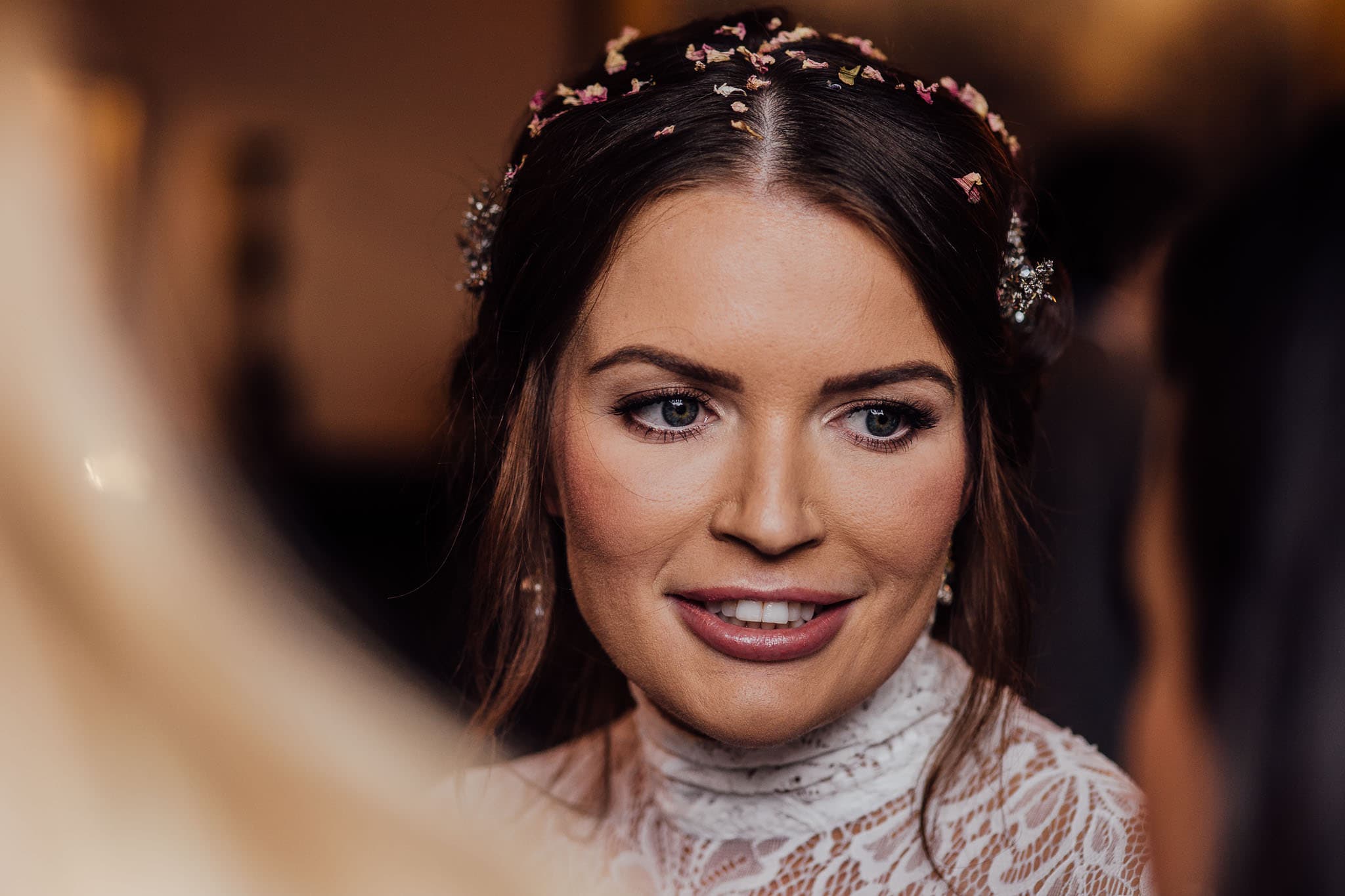 close up of bride with confetti in hair