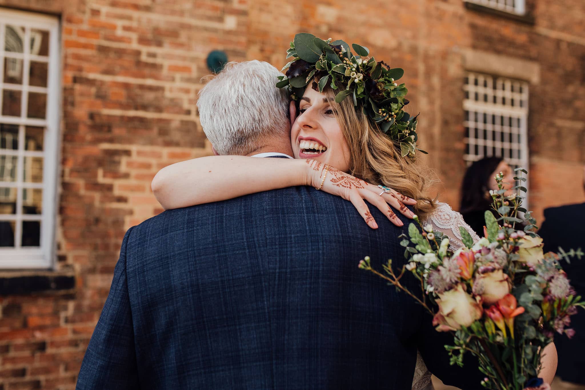 boho bride with hand tied bouquet