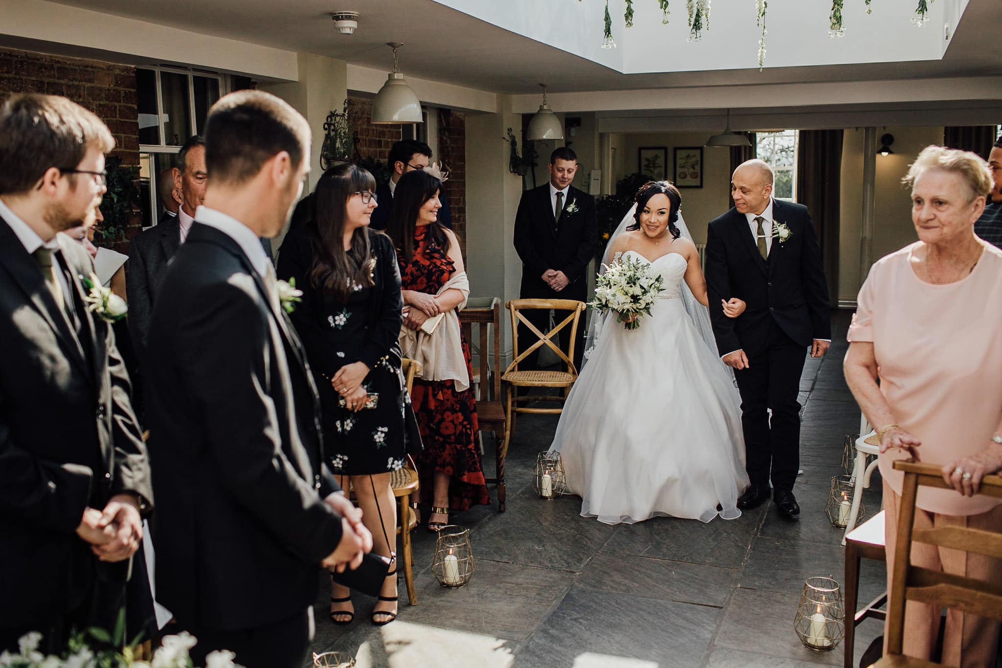 bride's entrance at the kedleston country house wedding venue