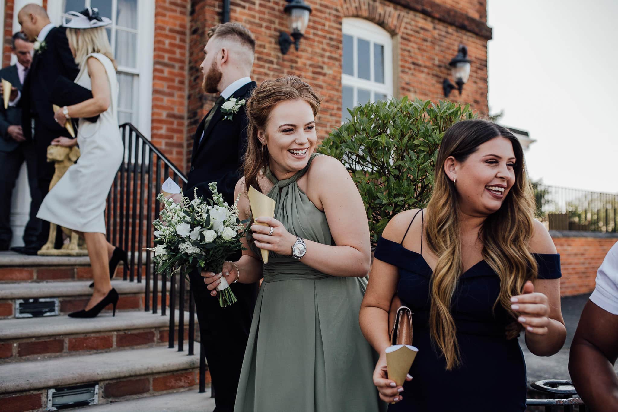 candid shot of guests on the steps