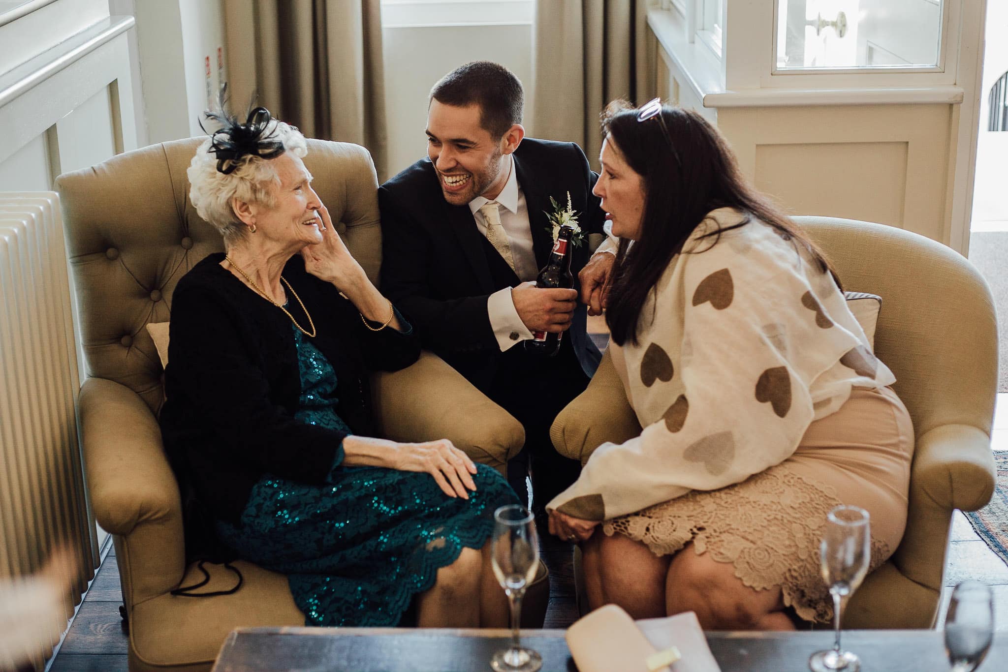 unposed family photo at wedding