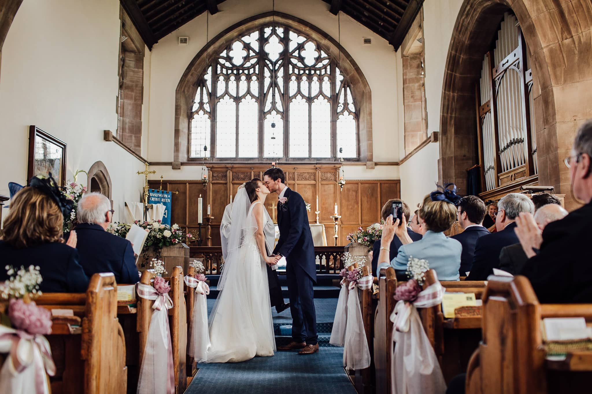 bride and groom's first kiss