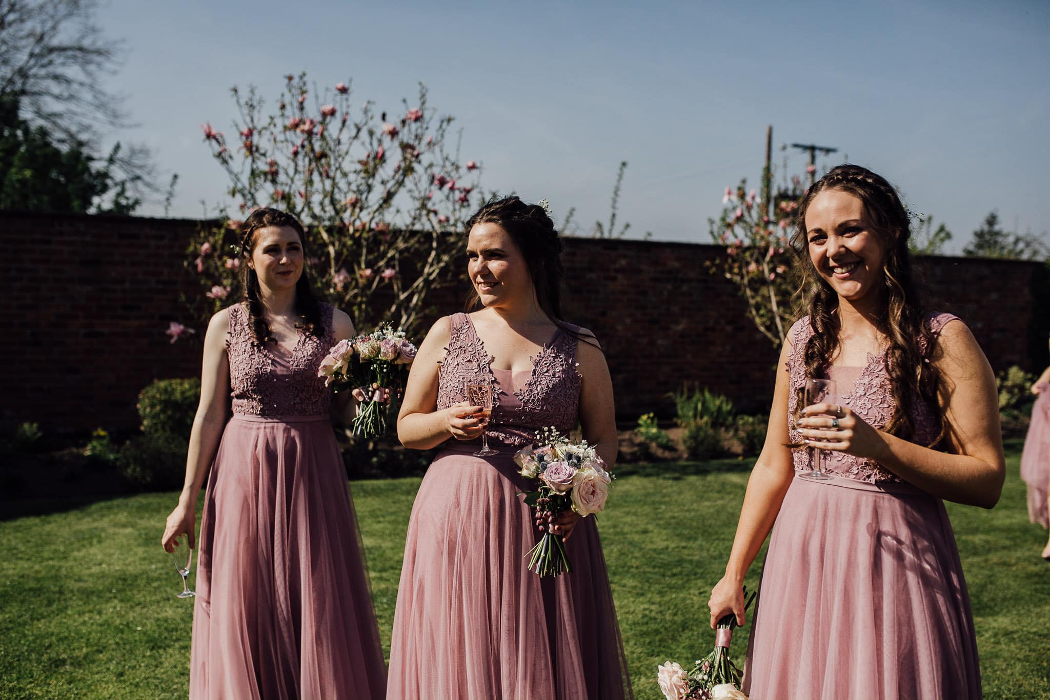 bridesmaids in pink gowns at Colshaw Hall