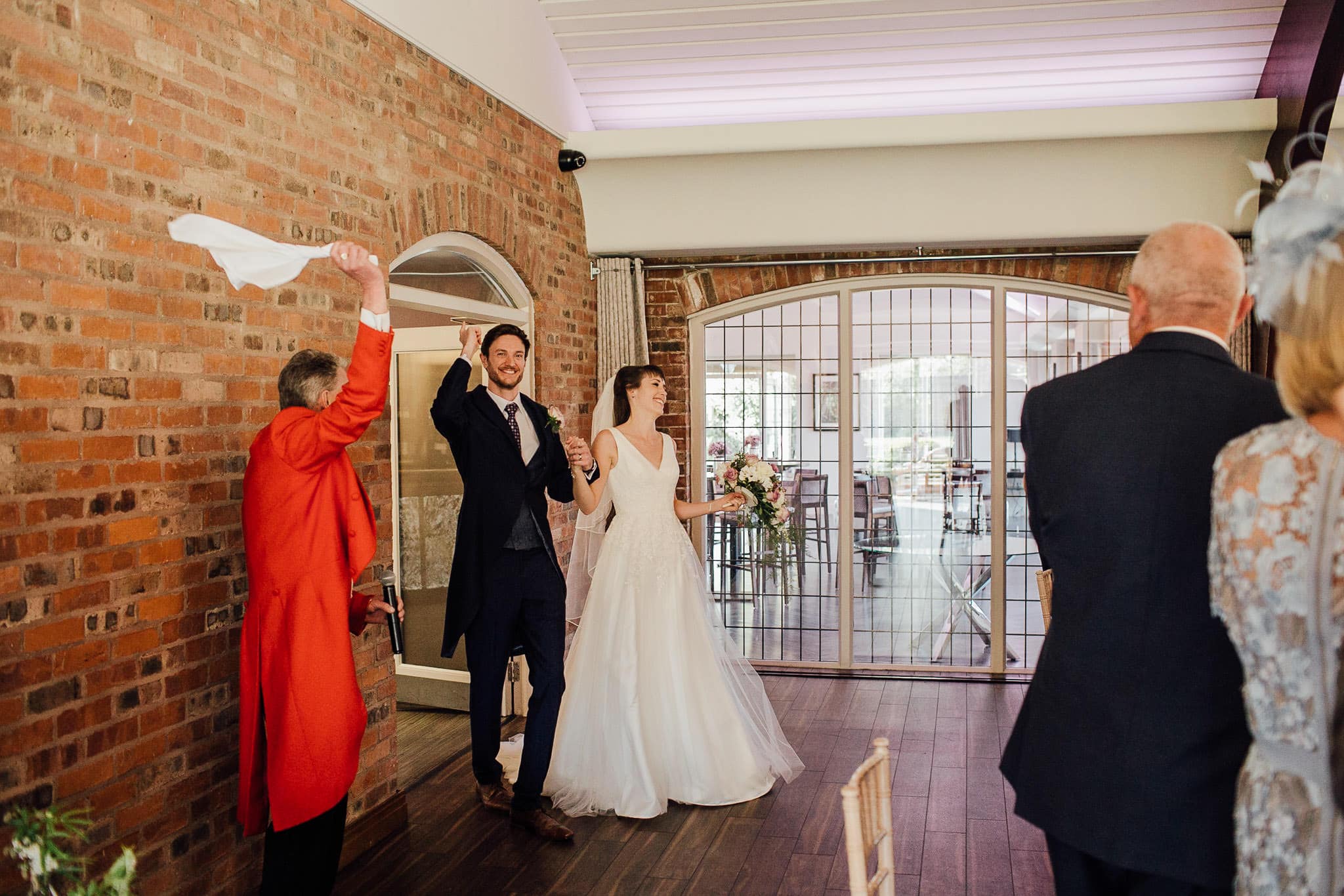 entrance to the wedding breakfast with master of ceremonies