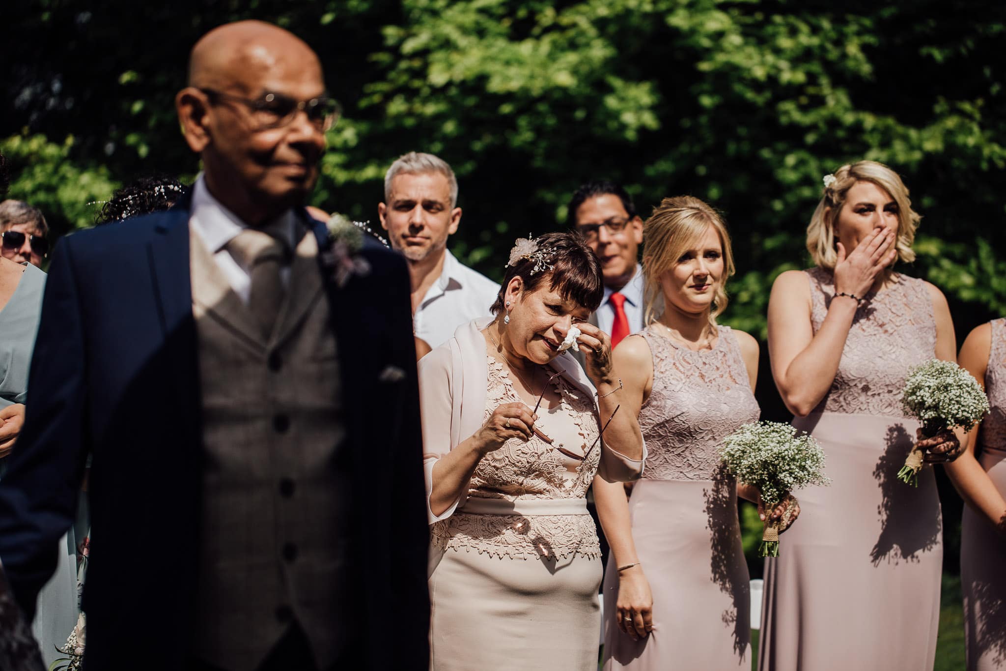 Mother of the Bride sheds a tear during ceremony