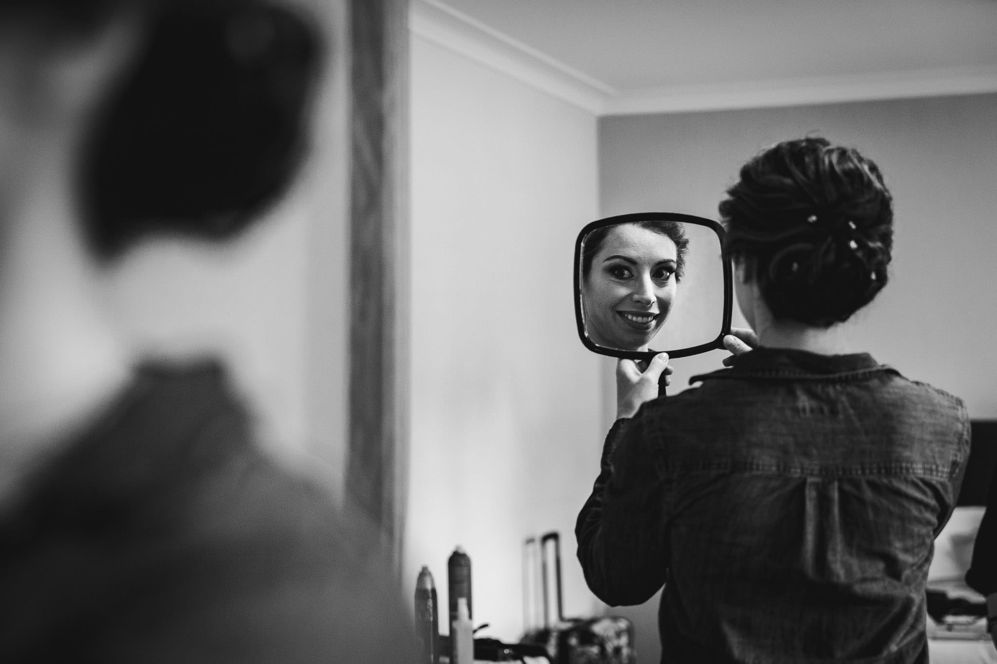 bride looking at her reflection