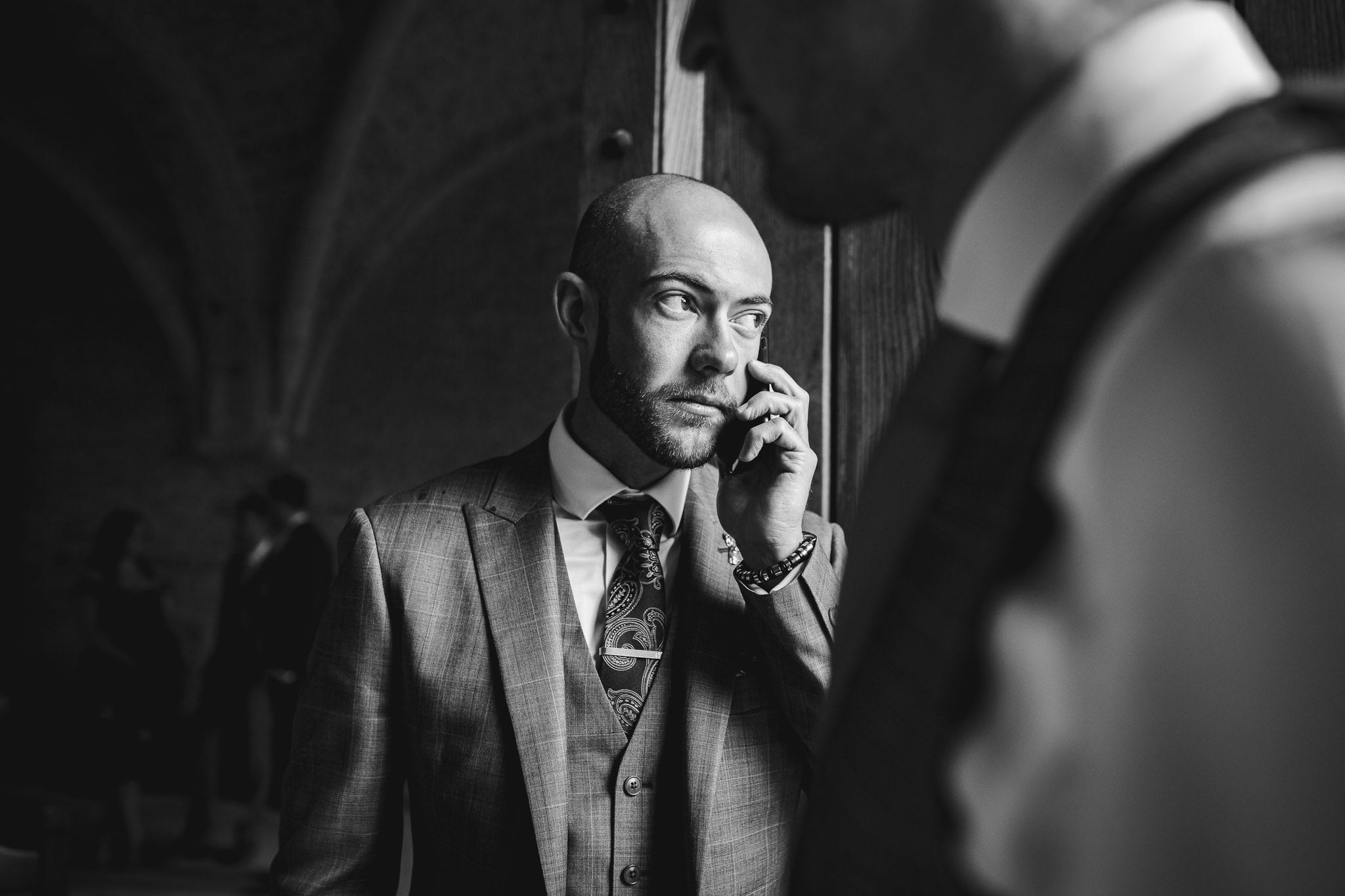 black and white shot of groom at San Galgano Abbey