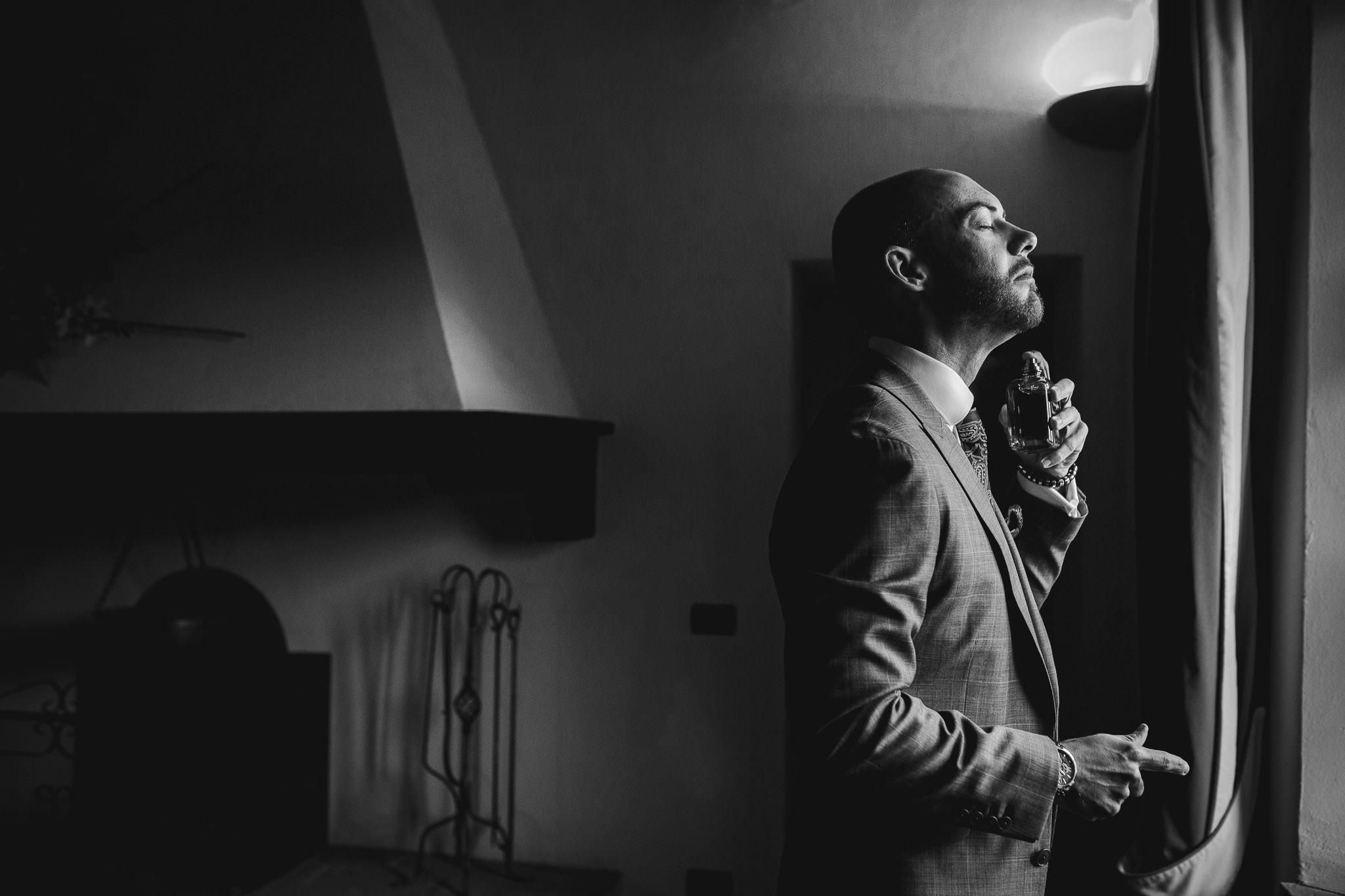 groom putting on personalised aftershave