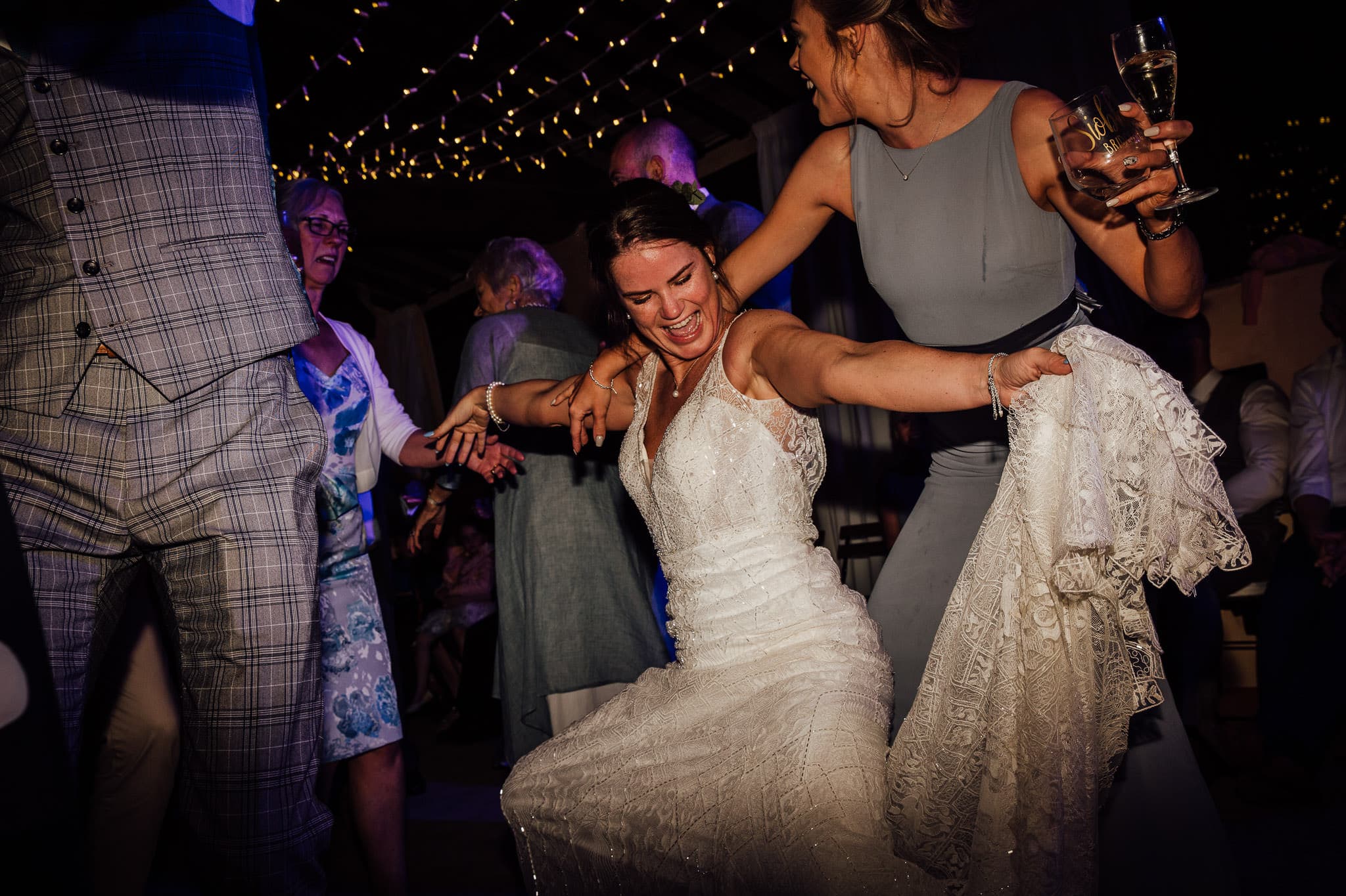 bride throwing shapes on the dance floor