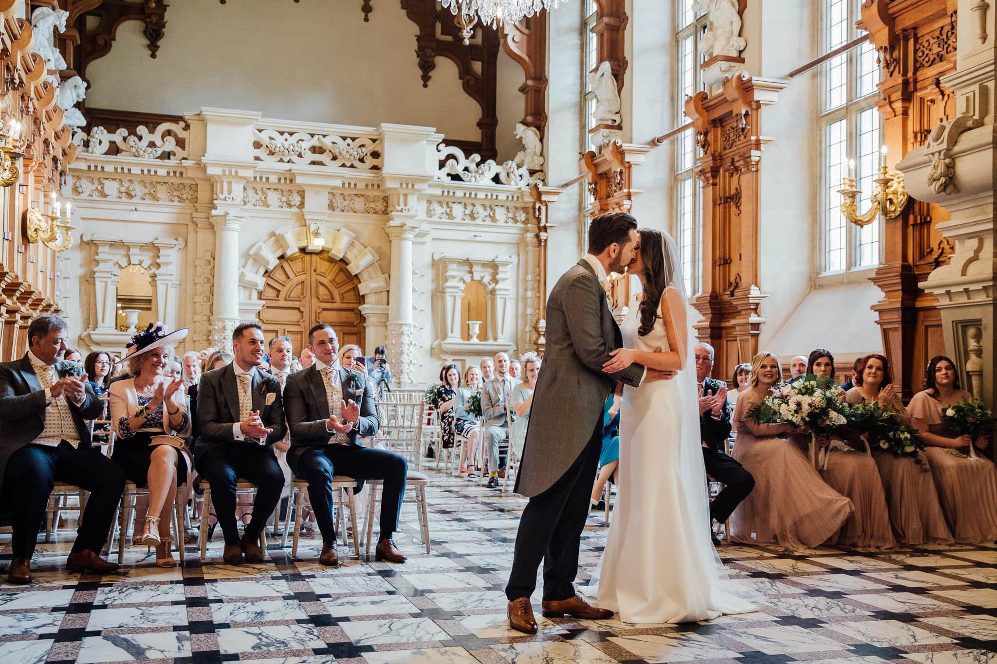 first kiss at Harlaxton Manor wedding