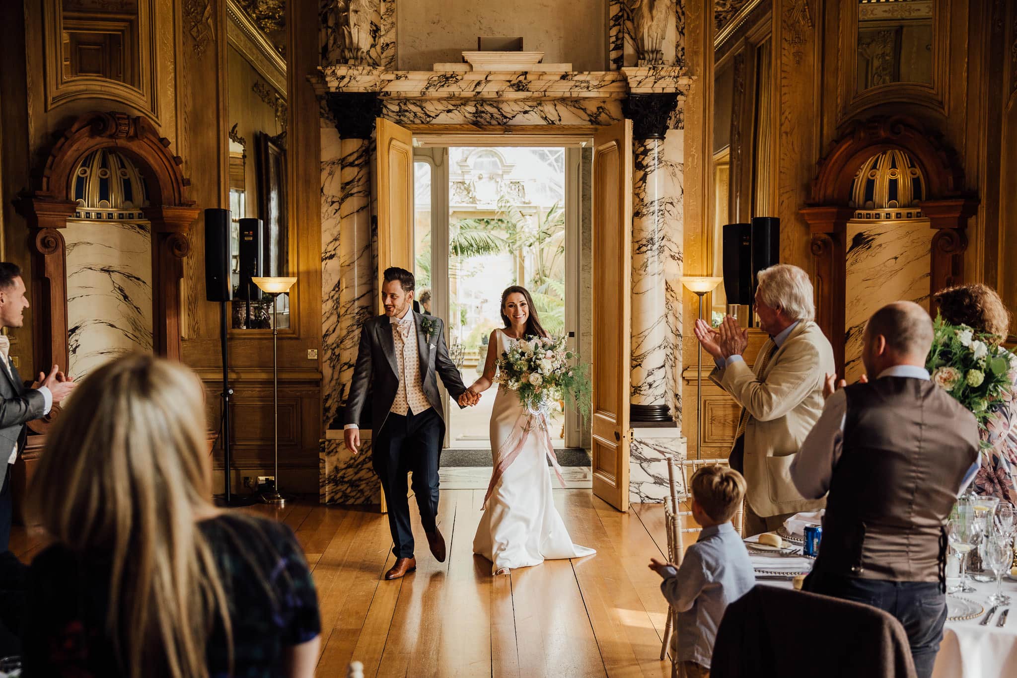 bride and groom wedding breakfast entrance