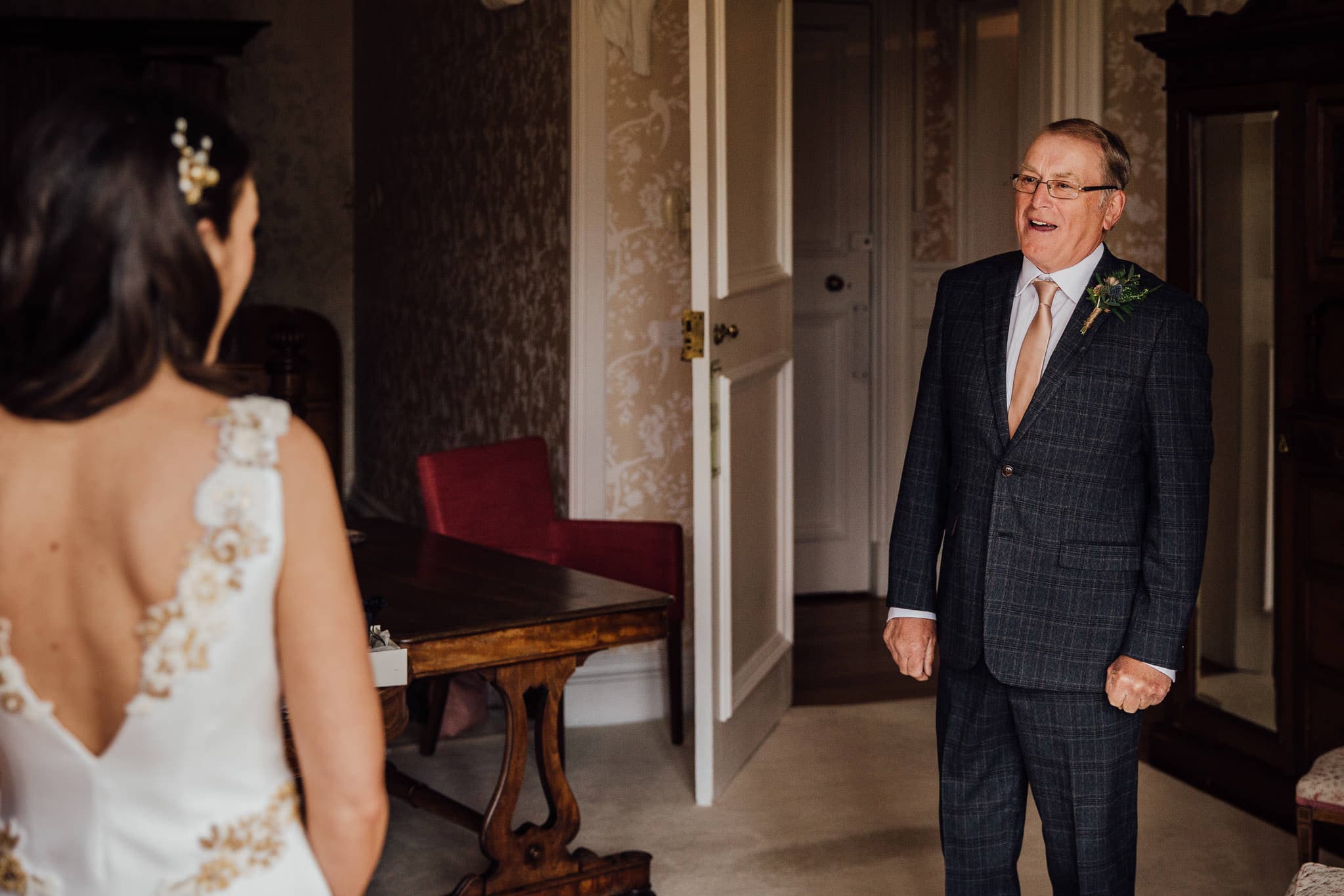 Father of the bride sees dress for first time