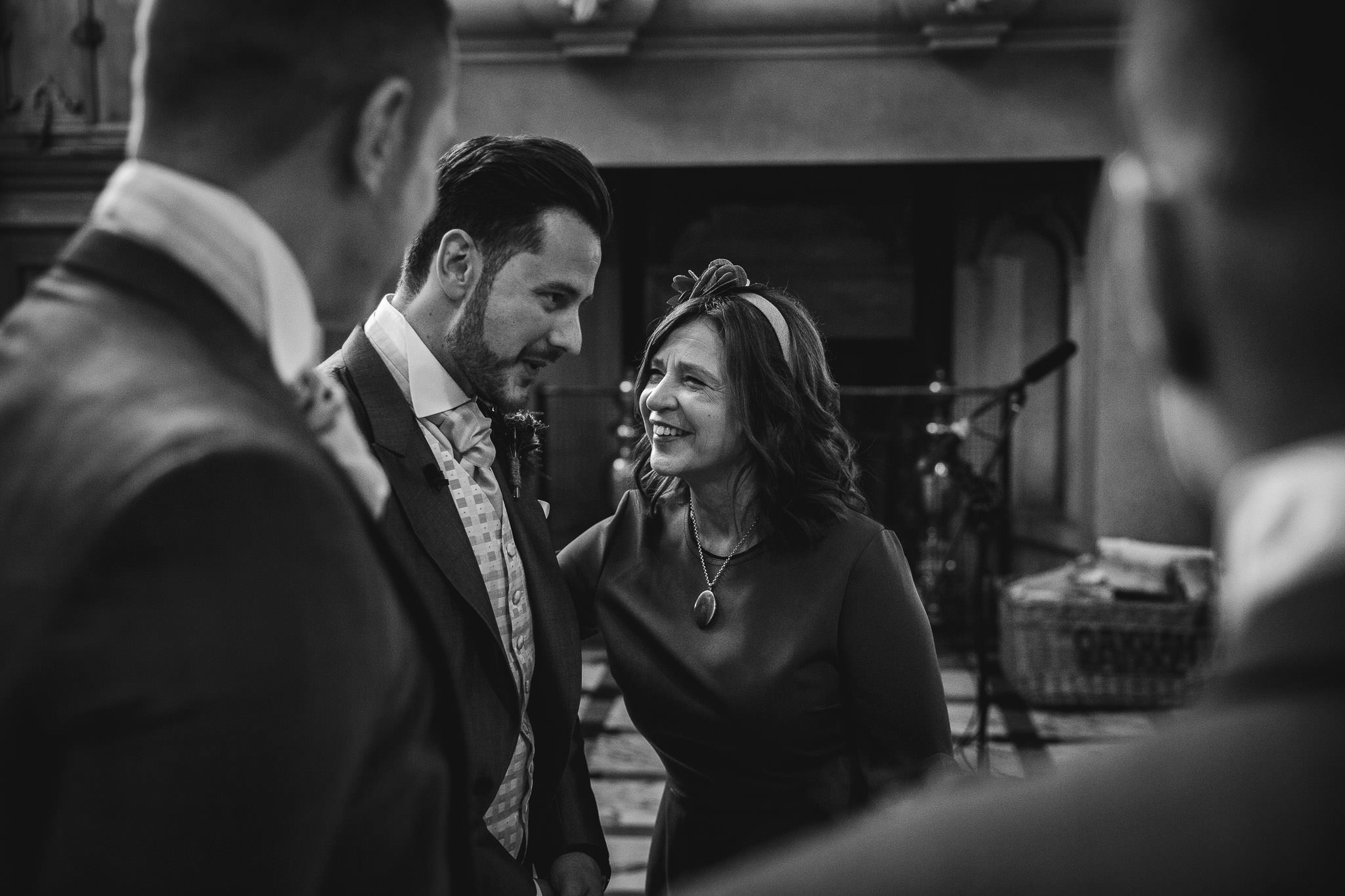 mother of the bride with anxious groom before ceremony