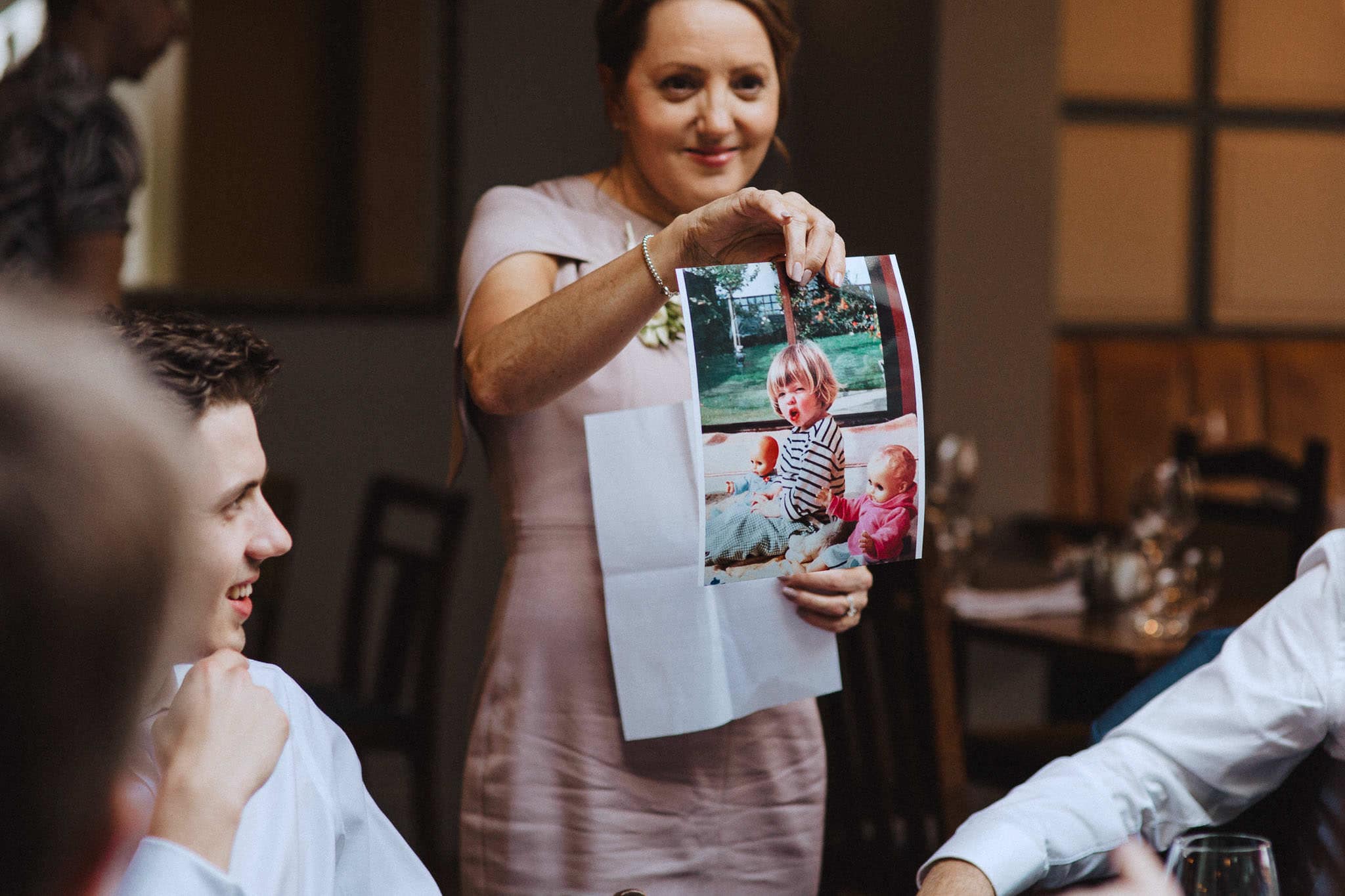 embarrassing old photos come out during wedding speech