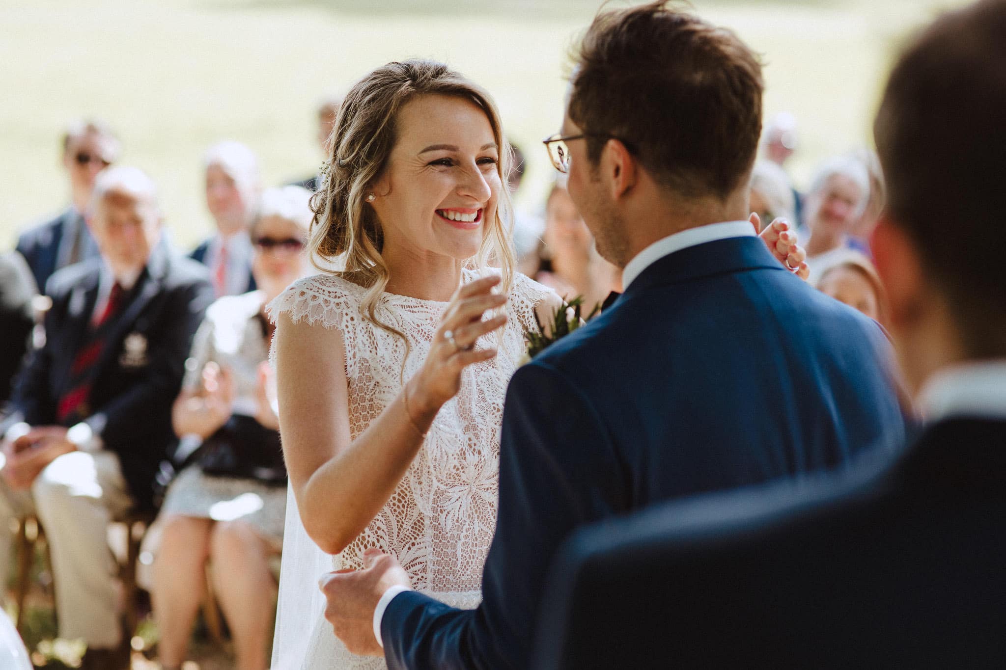 happy bride going in for first kiss