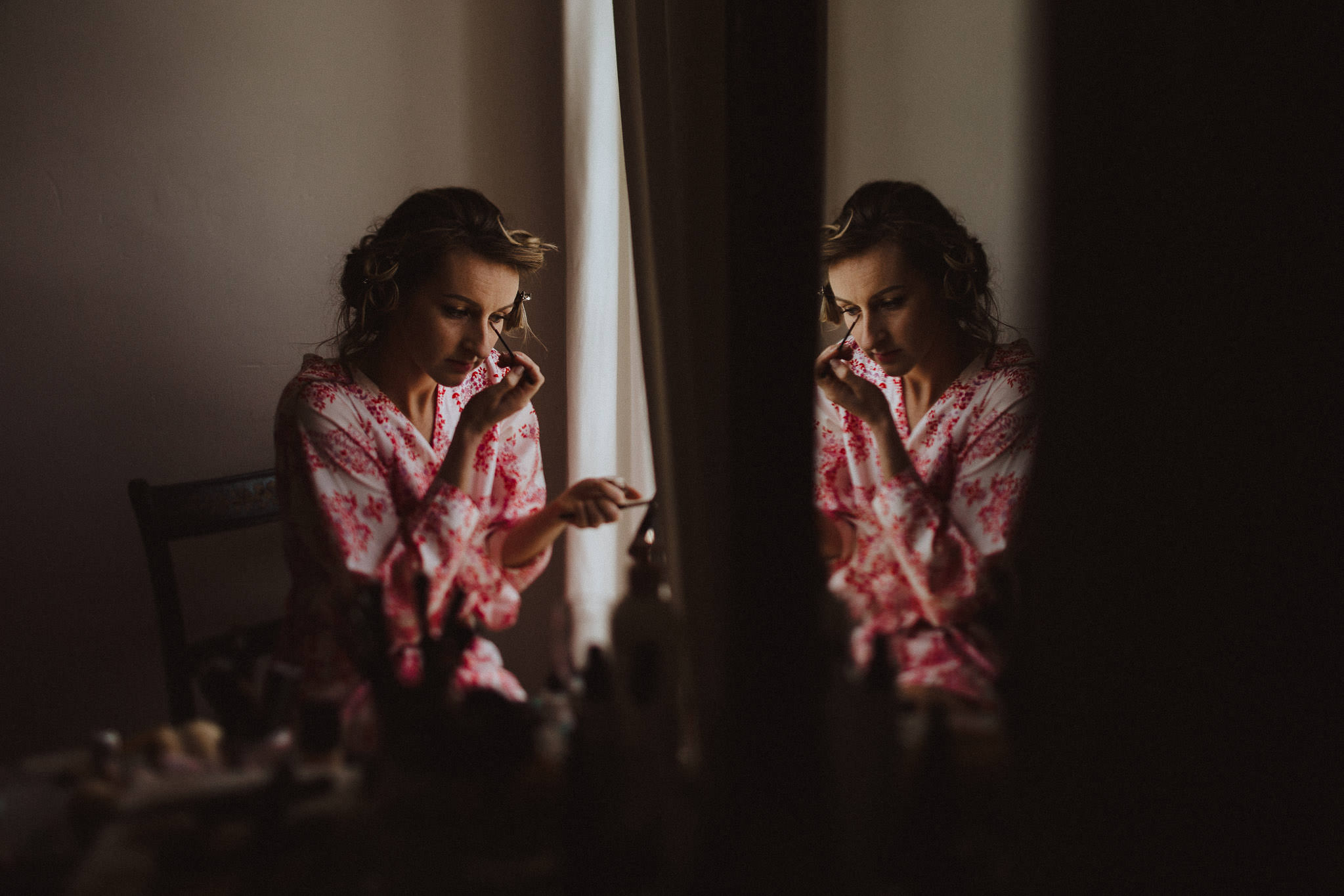 beautiful moody bridal prep shot with reflection