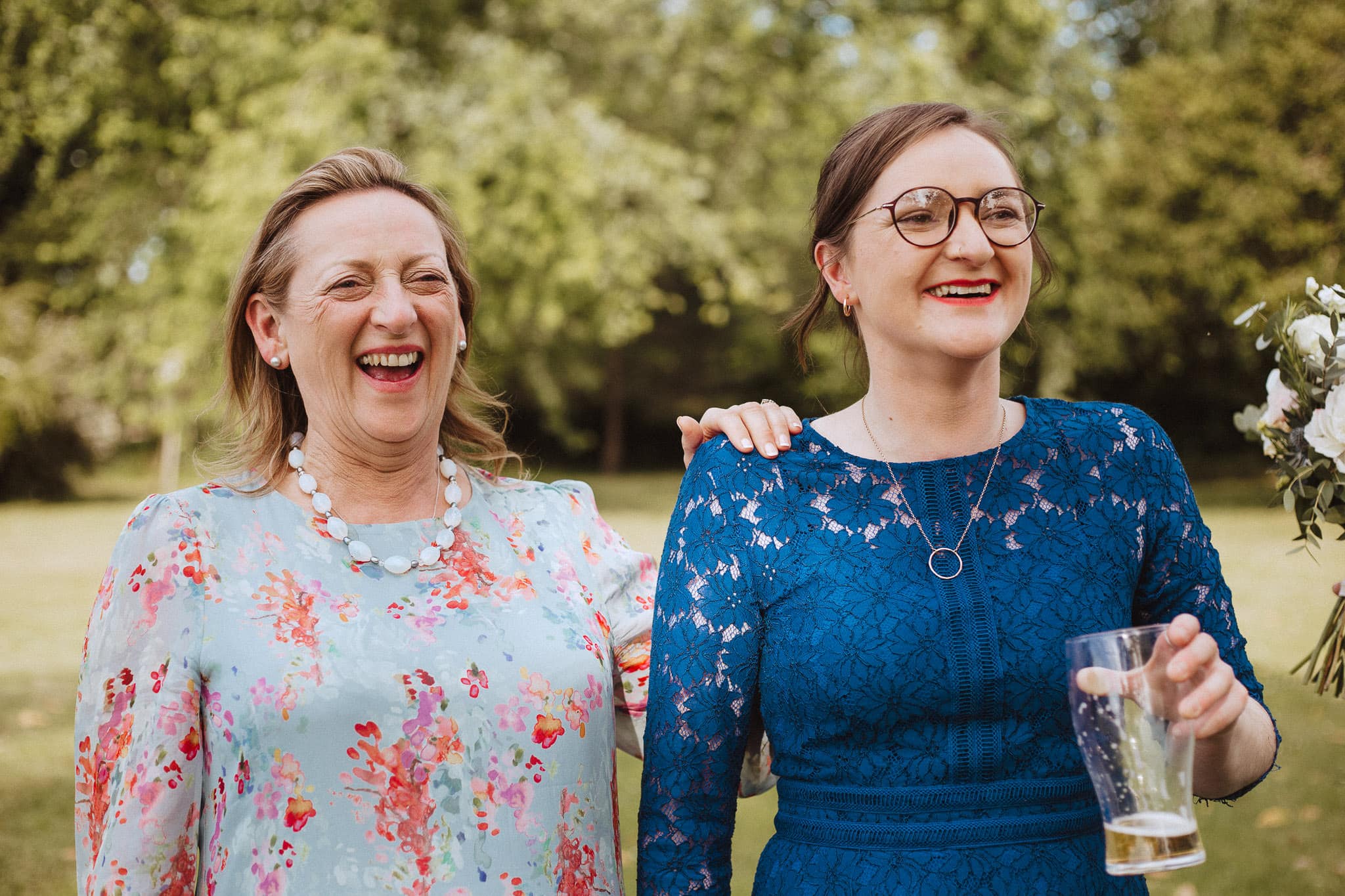 close up of mother of the bride laughing