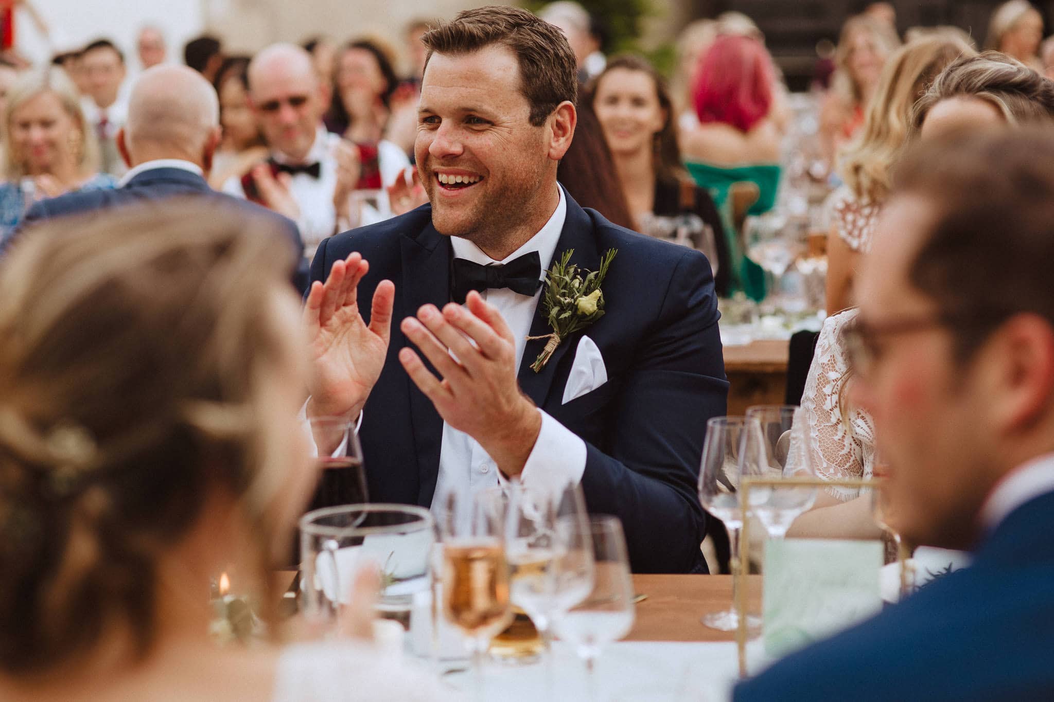 groomsman applauding