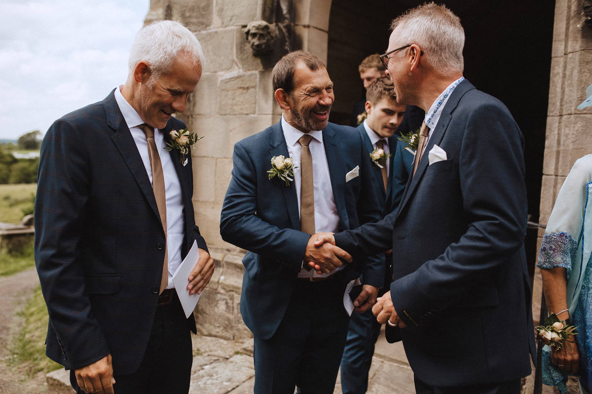 Father of the groom congratulates Father of the bride
