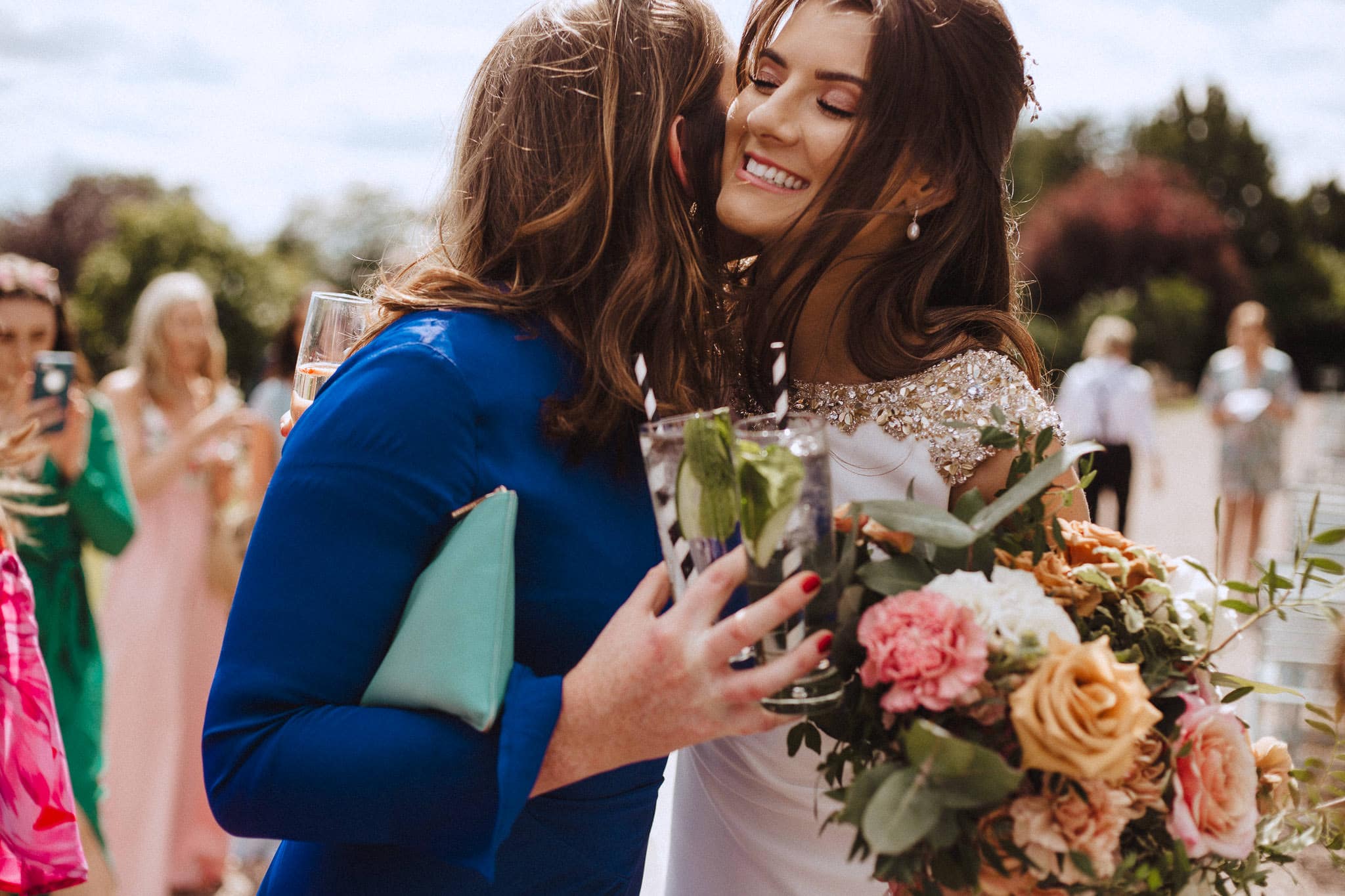 bride hugging guest