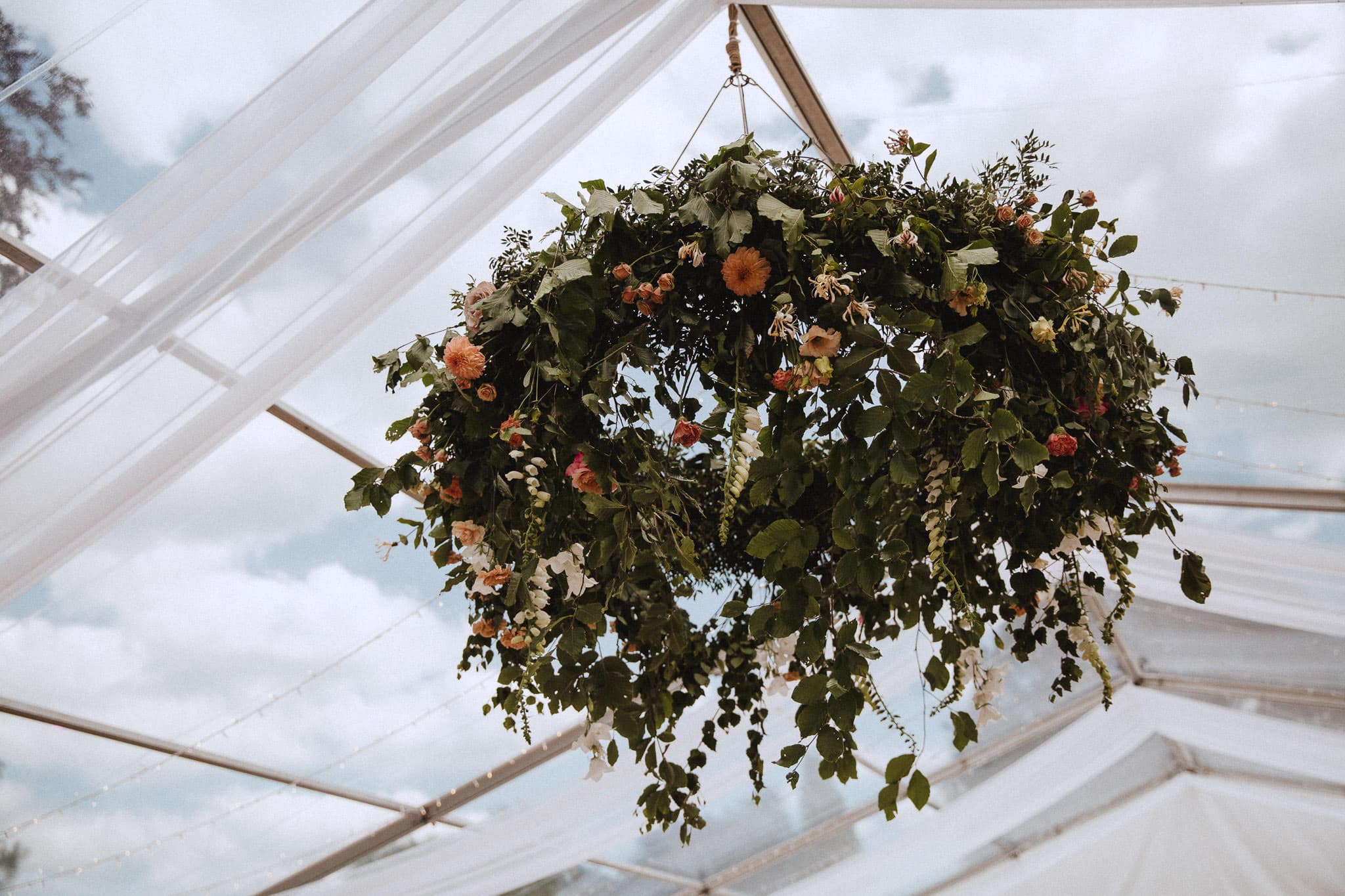hanging floral crown in marquee