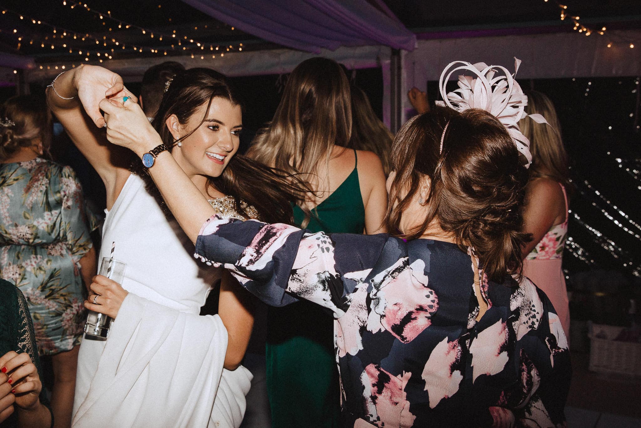 bride and her mum dancing